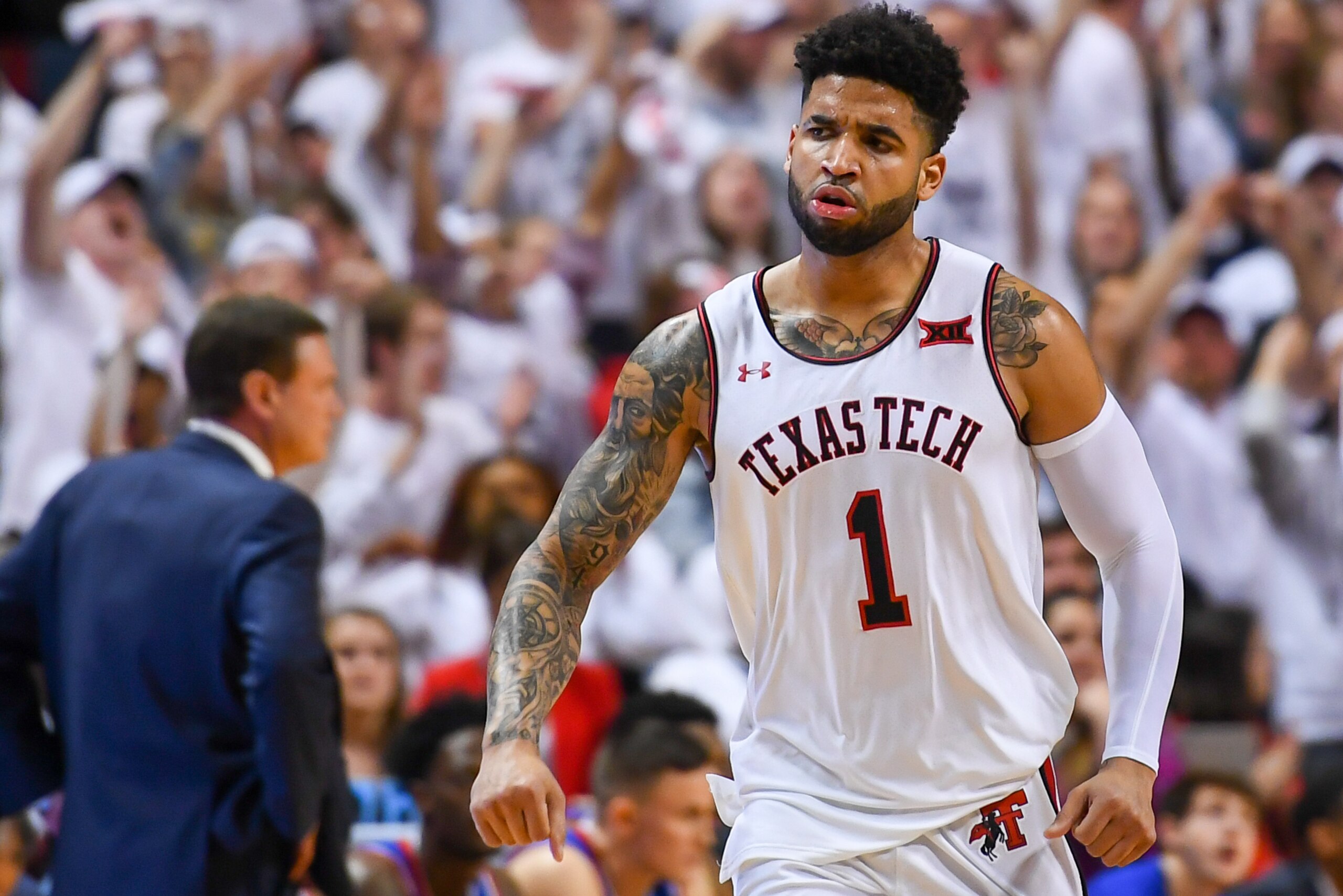 LUBBOCK, TX - FEBRUARY 23: Brandone Francis #1 of the Texas Tech Red Raiders reacts after making a three point basket during the first half of the game against the Kansas Jayhawks on February 23, 2019 at United Supermarkets Arena in Lubbock, Texas.  (Phot
