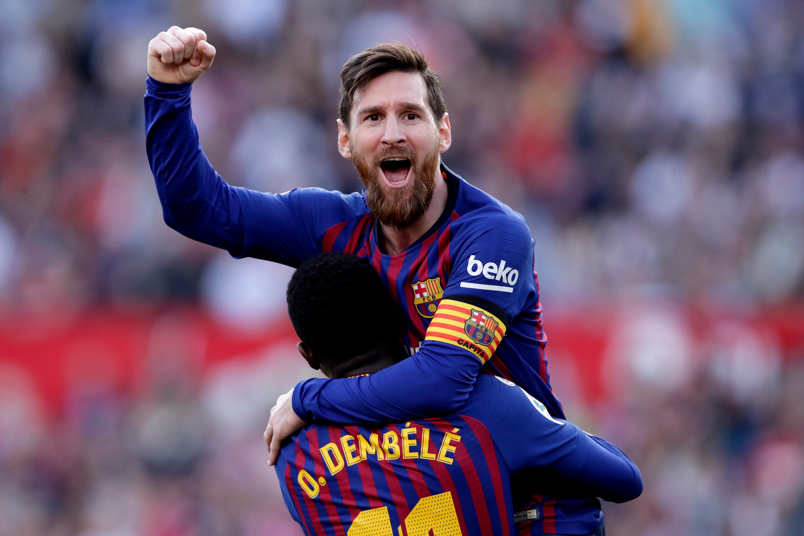 SEVILLA, SPAIN - FEBRUARY 23: Lionel Messi of FC Barcelona celebrates 2-2 with Ousmane Dembele of FC Barcelona  during the La Liga Santander  match between Sevilla v FC Barcelona at the Estadio Ramon Sanchez Pizjuan on February 23, 2019 in Sevilla Spain (