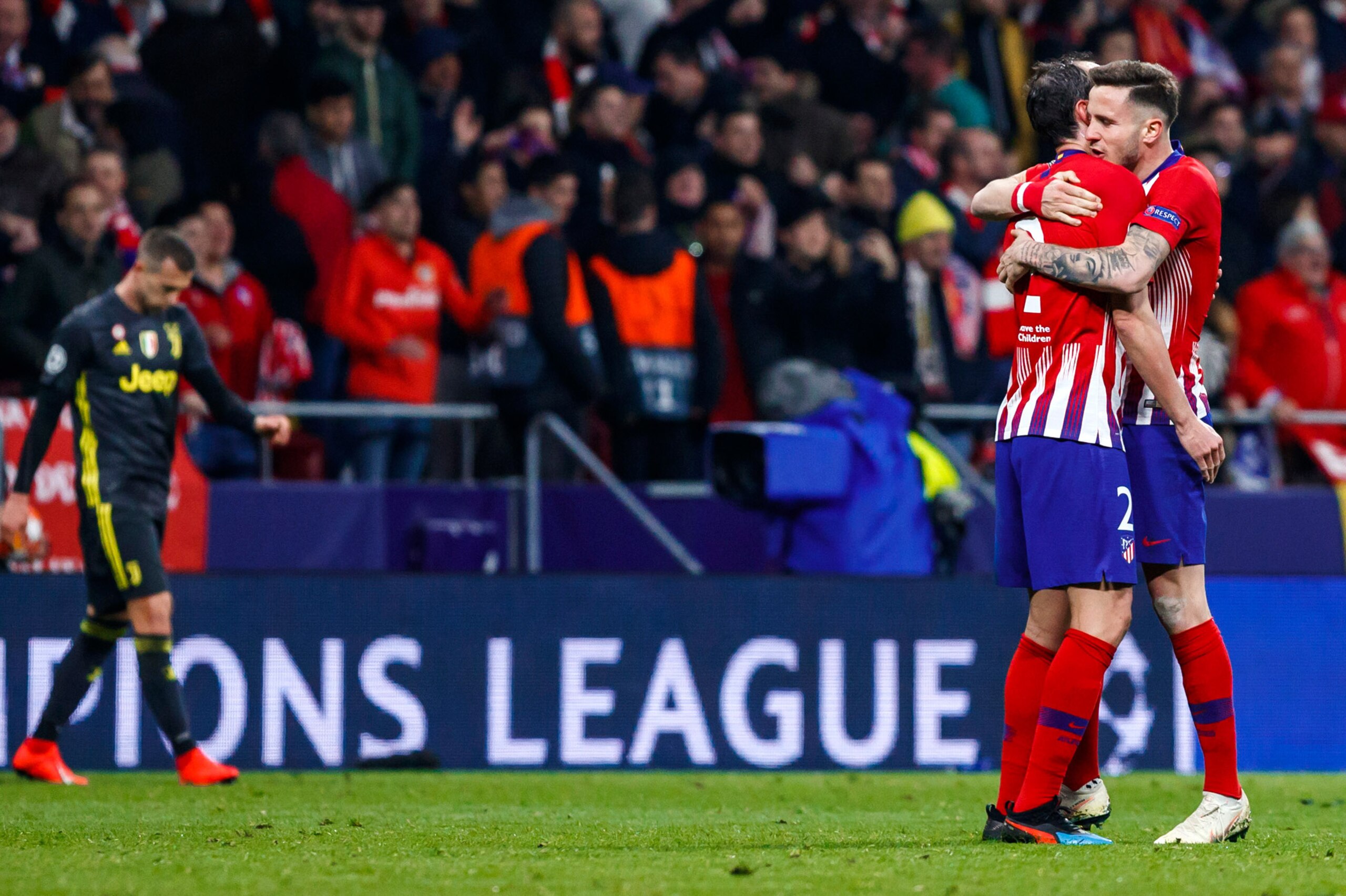 MADRID, SPAIN - FEBRUARY 20: Saul Niguez of Atletico Madrid and Diego Godin of Atletico Madrid gesture during the UEFA Champions League Round of 16 First Leg match between Club Atletico de Madrid and Juventus at Estadio Wanda Metropolitano on February 20,