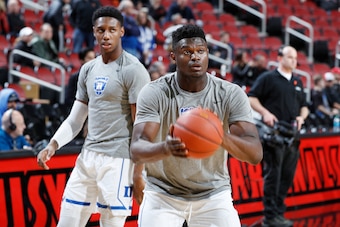LOUISVILLE, KY - FEBRUARY 12: Zion Williamson #1 and RJ Barrett #5 of the Duke Blue Devils warm up before the game against the Louisville Cardinals at KFC YUM! Center on February 12, 2019 in Louisville, Kentucky. Duke came from behind to win 71-69. (Photo