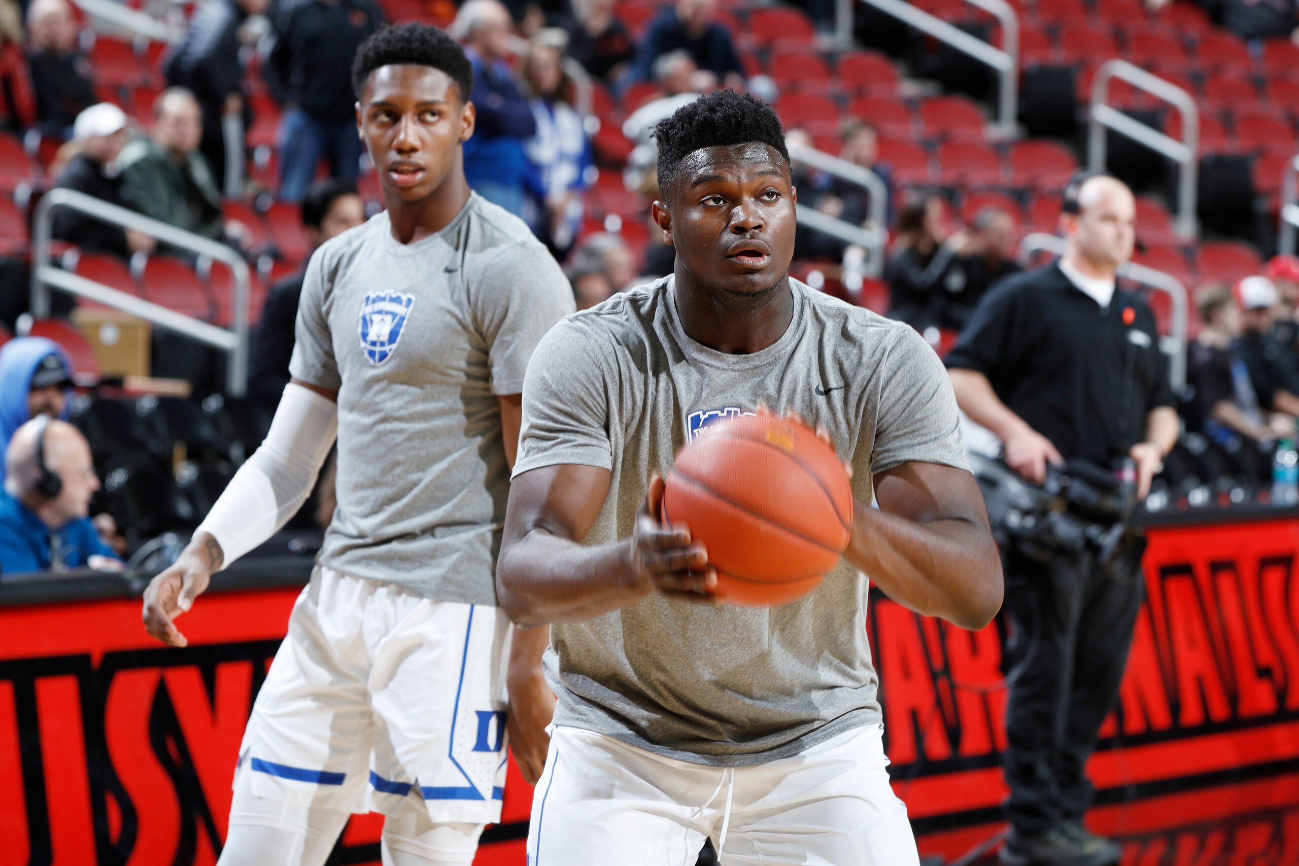LOUISVILLE, KY - FEBRUARY 12: Zion Williamson #1 and RJ Barrett #5 of the Duke Blue Devils warm up before the game against the Louisville Cardinals at KFC YUM! Center on February 12, 2019 in Louisville, Kentucky. Duke came from behind to win 71-69. (Photo
