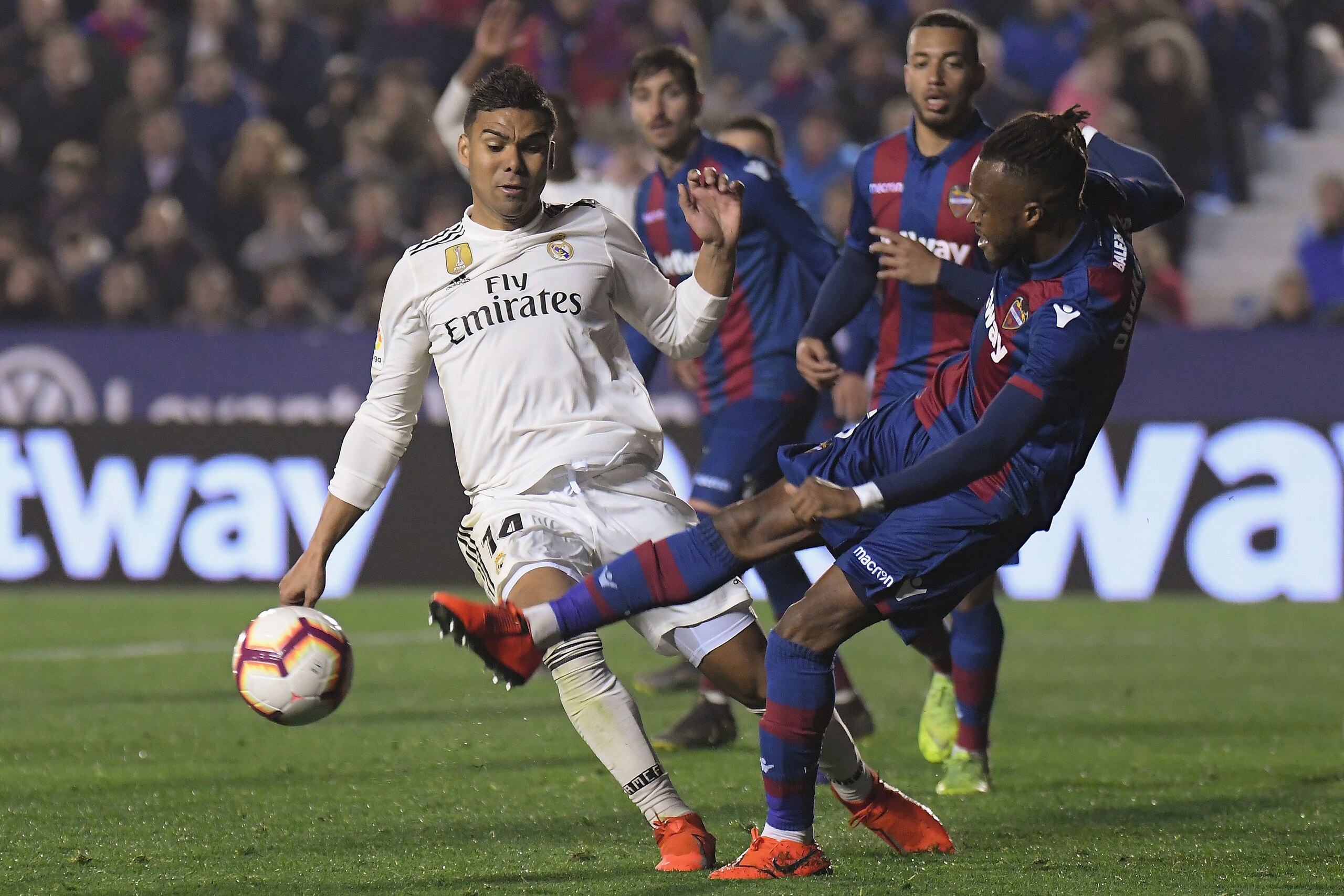 Real Madrid's Brazilian midfielder Casemiro (L) challenges Levante's Ivorian midfielder Cheick Doukoure during the Spanish league football match between Levante UD and Real Madrid CF at the Ciutat de Valencia stadium in Valencia on February 24, 2019. (Pho Real Madrid's Brazilian midfielder Casemiro (L) challenges Levante's Ivorian midfielder Cheick Doukoure during the Spanish league football match between Levante UD and Real Madrid CF at the Ciutat de Valencia stadium in Valencia on February 24, 2019. (Pho