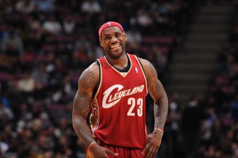 EAST RUTHERFORD,NJ - NOVEMBER 18:  LeBron James #23 of the Cleveland Cavaliers flashes a smile during the game against the New Jersey Nets on November 18, 2008 at the Izod Center in East Rutherford, New Jersey.  NOTE TO USER: User expressly acknowledges a