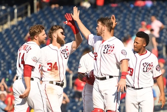 WASHINGTON, DC - SEPTEMBER 03:  Bryce Harper #34 of the Washington Nationals celebrates his walk-off, sacrifice fly in the 10th inning during a baseball game against the St Louis Cardinals at Nationals Park on September 3, 2018 in Washington, DC.  (Photo 