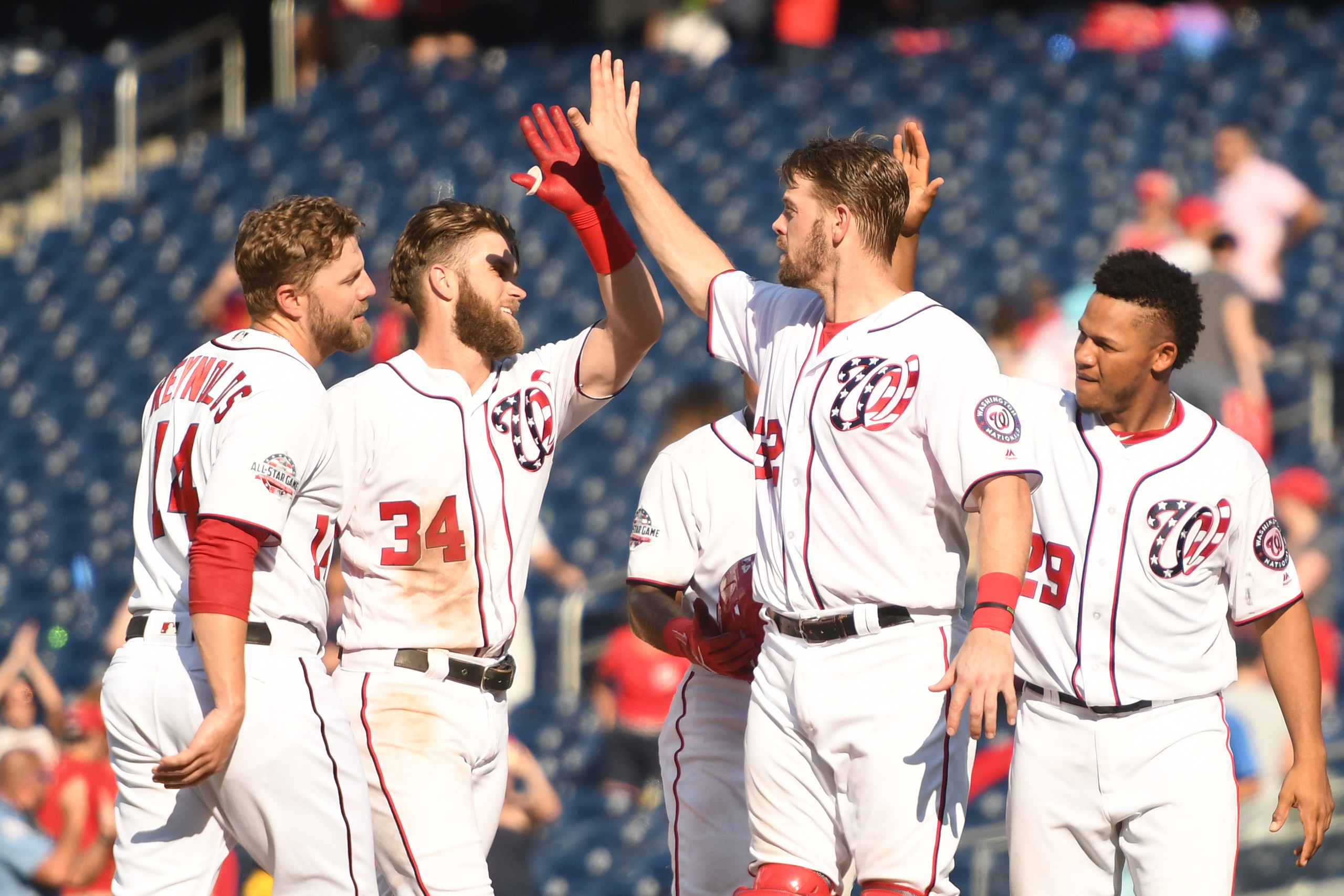 WASHINGTON, DC - SEPTEMBER 03: Bryce Harper #34 of the Washington Nationals celebrates his walk-off, sacrifice fly in the 10th inning during a baseball game against the St Louis Cardinals at Nationals Park on September 3, 2018 in Washington, DC. (Photo WASHINGTON, DC - SEPTEMBER 03: Bryce Harper #34 of the Washington Nationals celebrates his walk-off, sacrifice fly in the 10th inning during a baseball game against the St Louis Cardinals at Nationals Park on September 3, 2018 in Washington, DC. (Photo