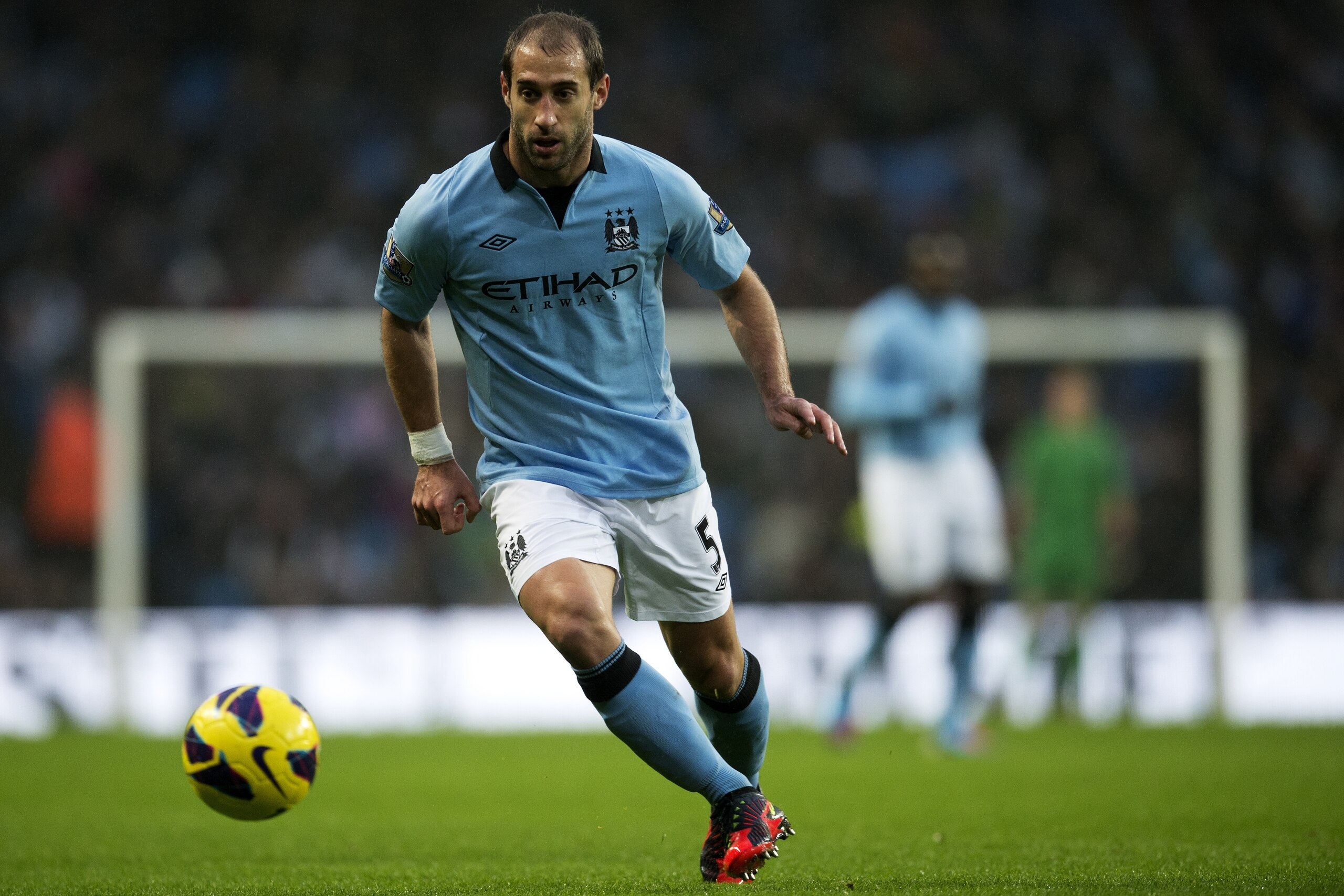 Manchester City's  Argentinian defender Pablo Zabaleta runs with the ball against Reading during the Premiership football match between Manchester City and Reading at The Etihad stadium in Manchester, northwest of England on December 22, 2012. Manchester 