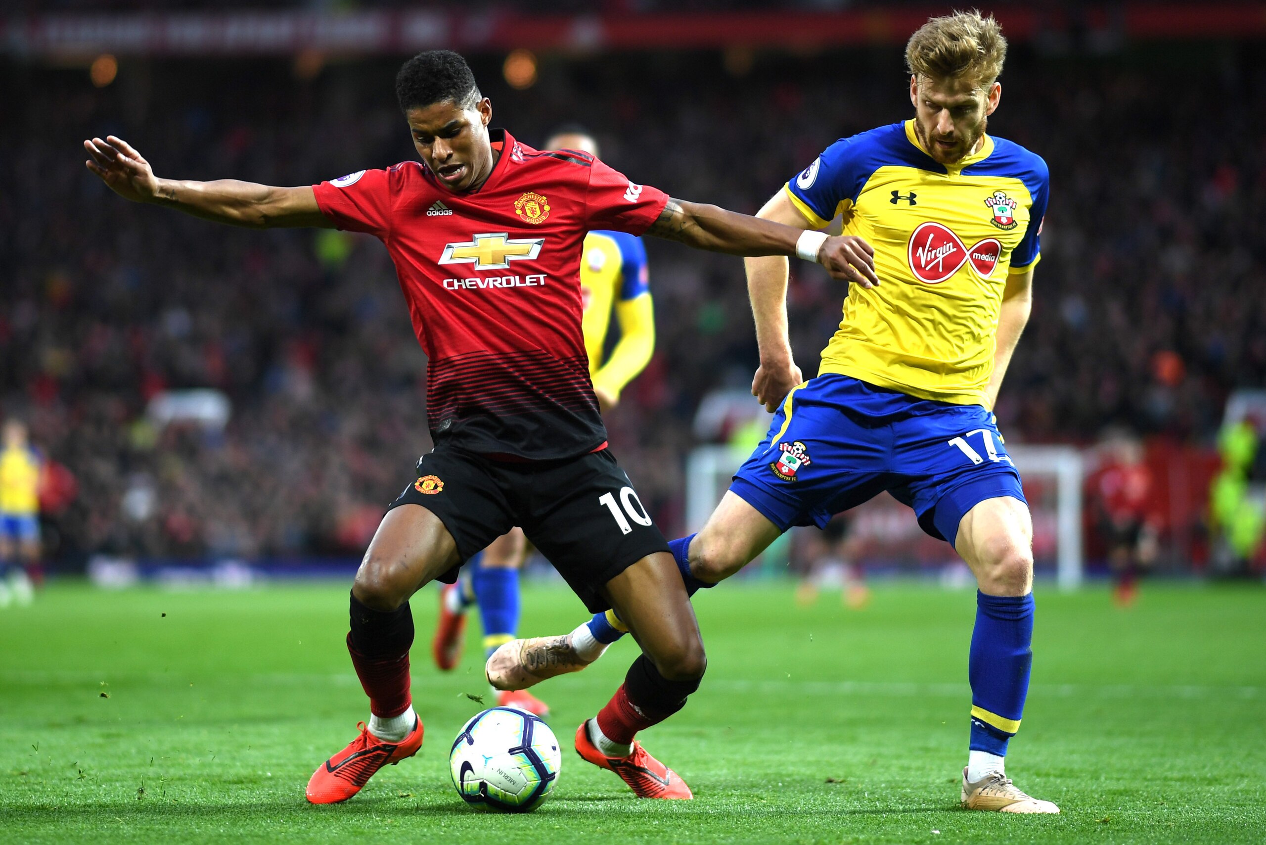 MANCHESTER, ENGLAND - MARCH 02: Marcus Rashford of Manchester United is fouled in the box by Stuart Armstrong of Southampton resulting in a penalty during the Premier League match between Manchester United and Southampton FC at Old Trafford on March 02, 2