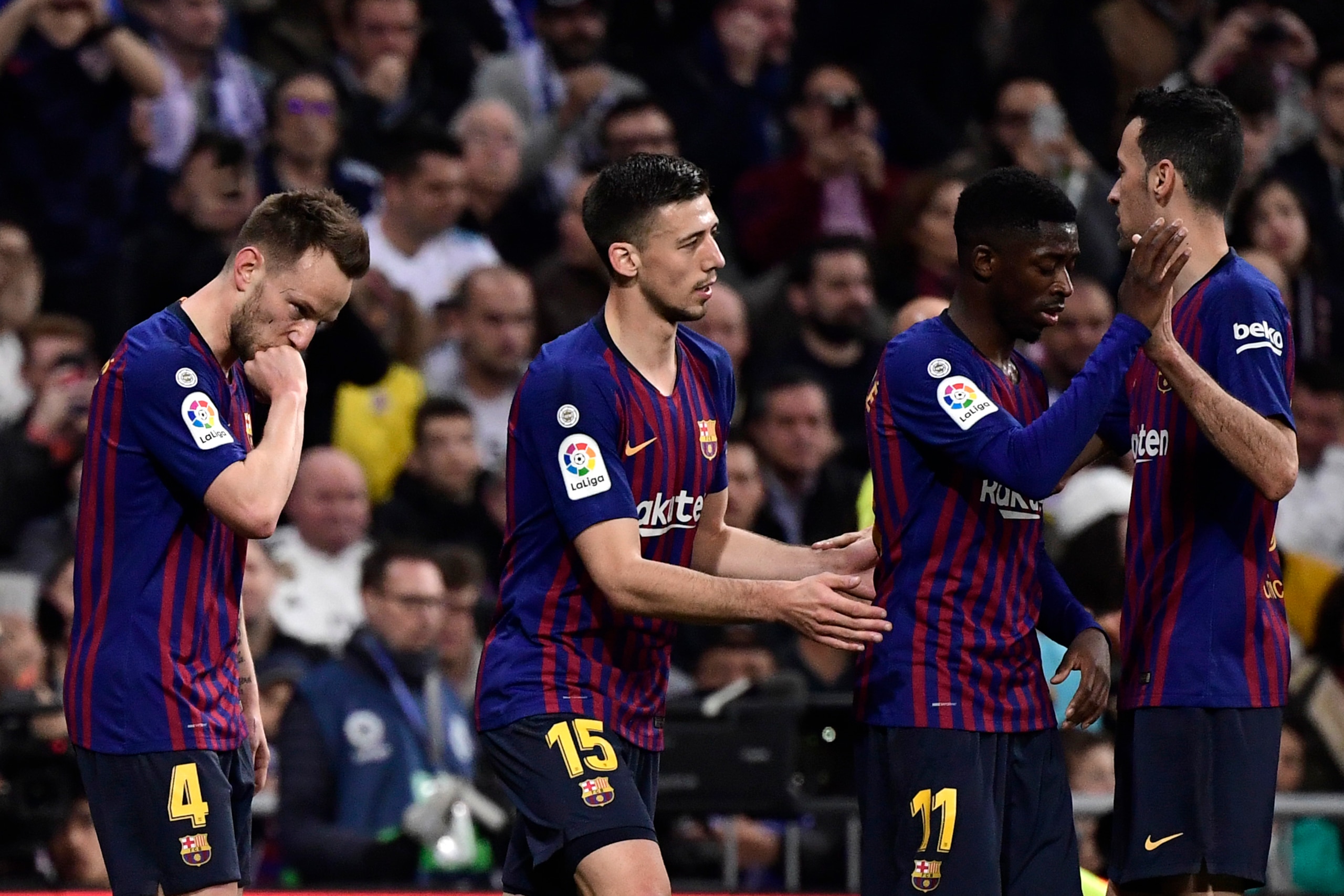 Barcelona's Croatian midfielder Ivan Rakitic (L) celebrates with Barcelona's French defender Clement Lenglet (2ndL), Barcelona's French forward Ousmane Dembele and Barcelona's Spanish midfielder Sergio Busquets (R) after scoring a goal during the Spanish Barcelona's Croatian midfielder Ivan Rakitic (L) celebrates with Barcelona's French defender Clement Lenglet (2ndL), Barcelona's French forward Ousmane Dembele and Barcelona's Spanish midfielder Sergio Busquets (R) after scoring a goal during the Spanish