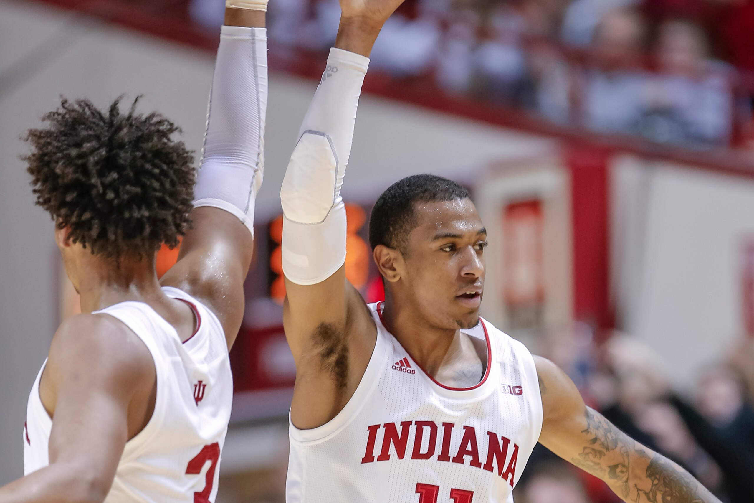 BLOOMINGTON, IN - MARCH 02:  Justin Smith #3 of the Indiana Hoosiers and Devonte Green #11 of the Indiana Hoosiers congratulate near the end of the game against the Michigan State Spartans at Assembly Hall on March 2, 2019 in Bloomington, Indiana. (Photo 