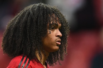 Manchester United's Dutch midfielder Tahith Chong leaves the pitch at the end of the English FA Cup third round football match between Manchester United and Reading at Old Trafford in Manchester, north west England, on January 5, 2019. (Photo by Oli SCARF