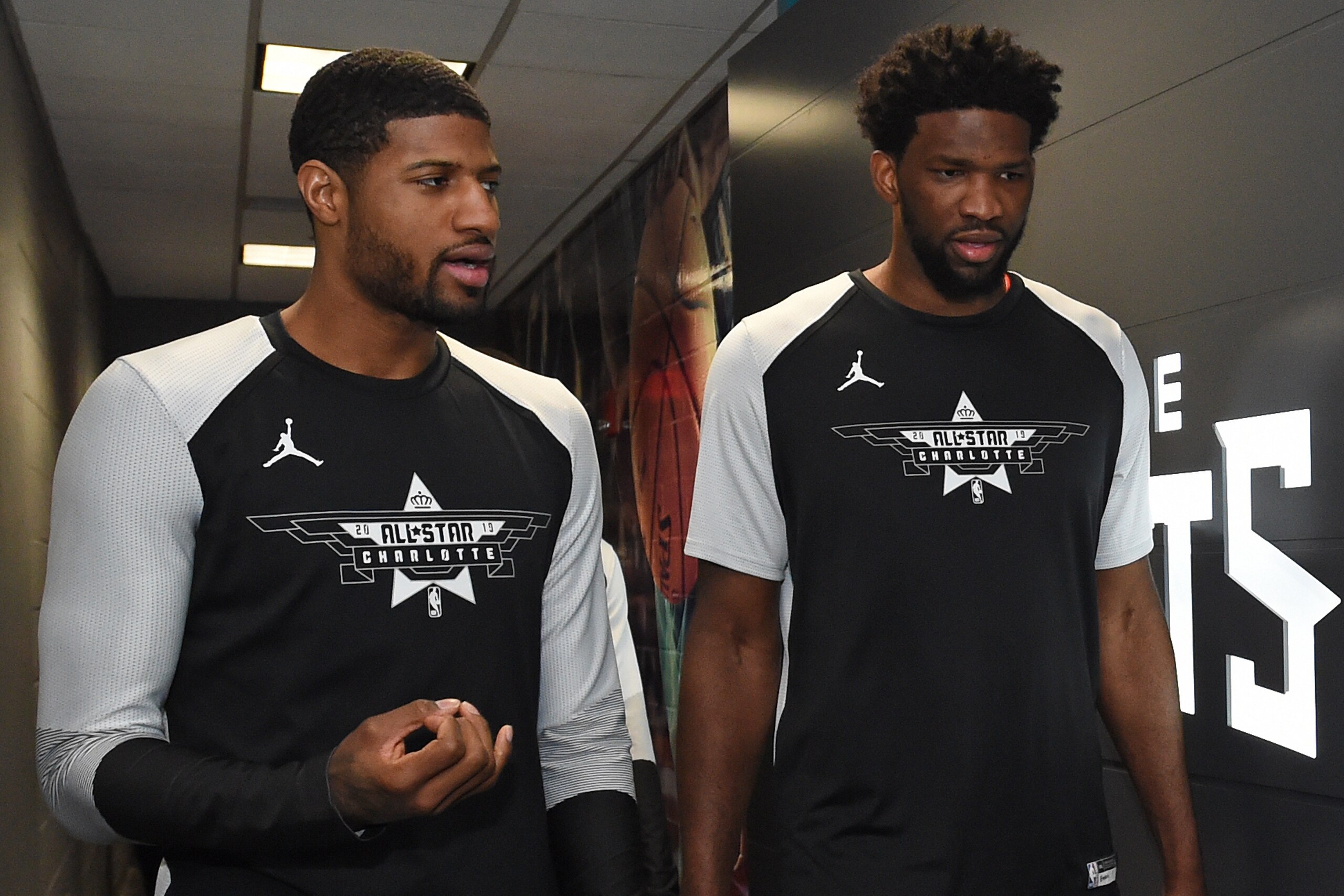 CHARLOTTE, NC - FEBRUARY 17: Paul George #13 and Joel Embiid #21 of Team Giannis are seen before the game against Team LeBron during the 2019 NBA All-Star Game on February 17, 2019 at Spectrum Center in Charlotte, North Carolina. NOTE TO USER: User expres