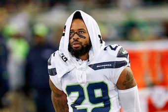 JACKSONVILLE, FL - DECEMBER 10: Safety Earl Thomas #29 of the Seattle Seahawks on the sideline with a Gatorade Towel wrapped around his head during the game against the Jacksonville Jaguars at EverBank Field on December 10, 2017 in Jacksonville, Florida. 