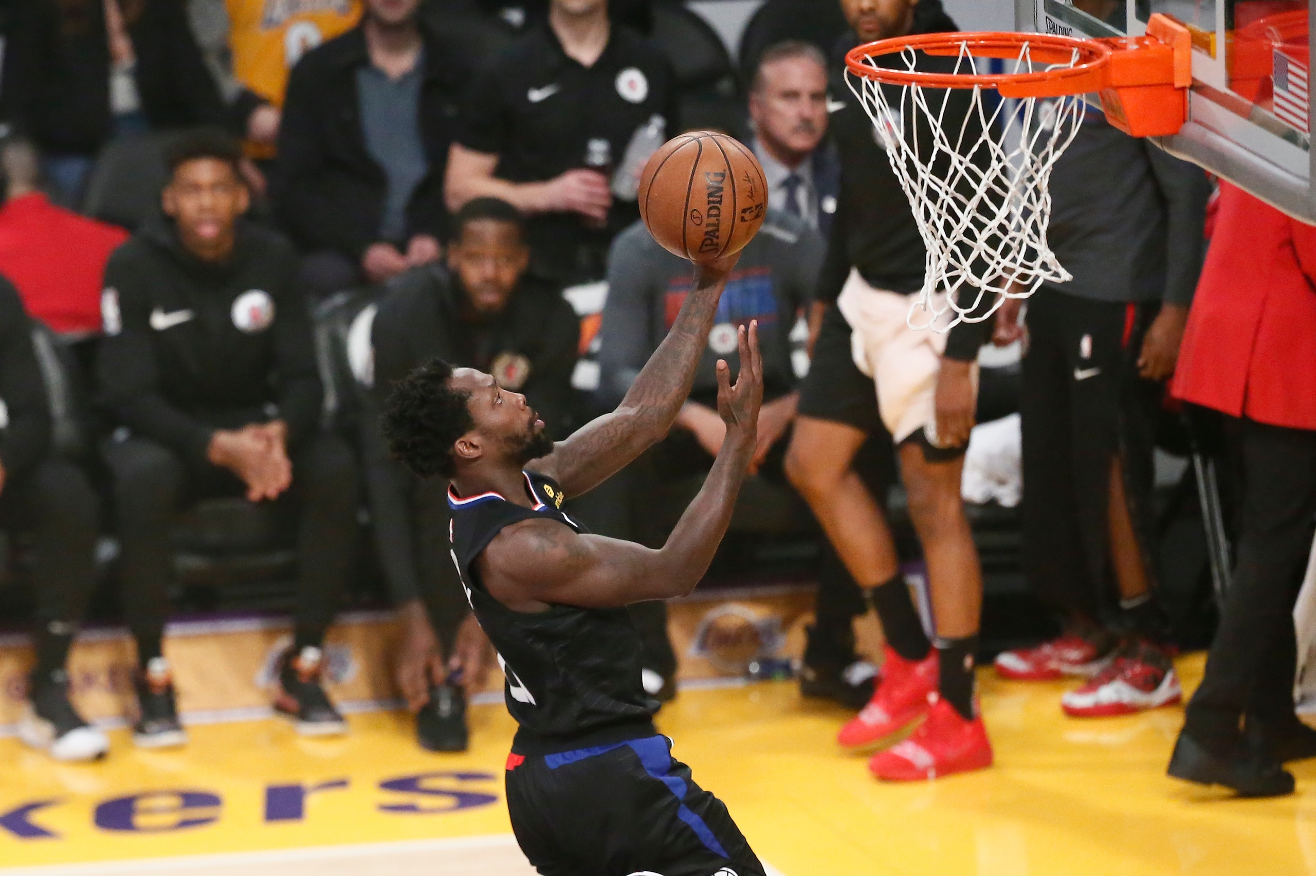 LOS ANGELES, CA - MARCH 4: Patrick Beverley #21 of the LA Clippers goes to the basket against the Los Angeles Lakers on March 4, 2019 at STAPLES Center in Los Angeles, California. NOTE TO USER: User expressly acknowledges and agrees that, by downloading a