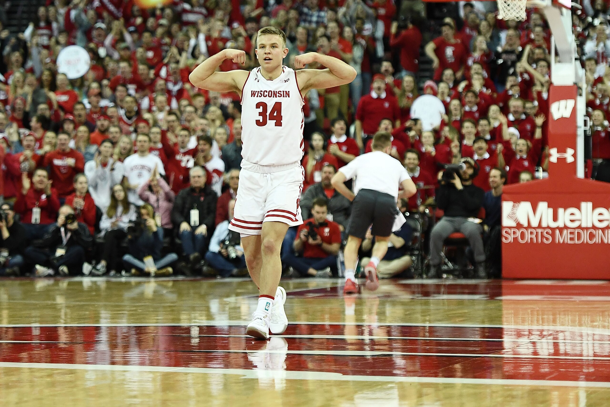 MADISON, WISCONSIN - MARCH 02:  Brad Davison #34 of the Wisconsin Badgers reacts to a score during the second half of a game against the Penn State Nittany Lions at Kohl Center on March 02, 2019 in Madison, Wisconsin. (Photo by Stacy Revere/Getty Images)