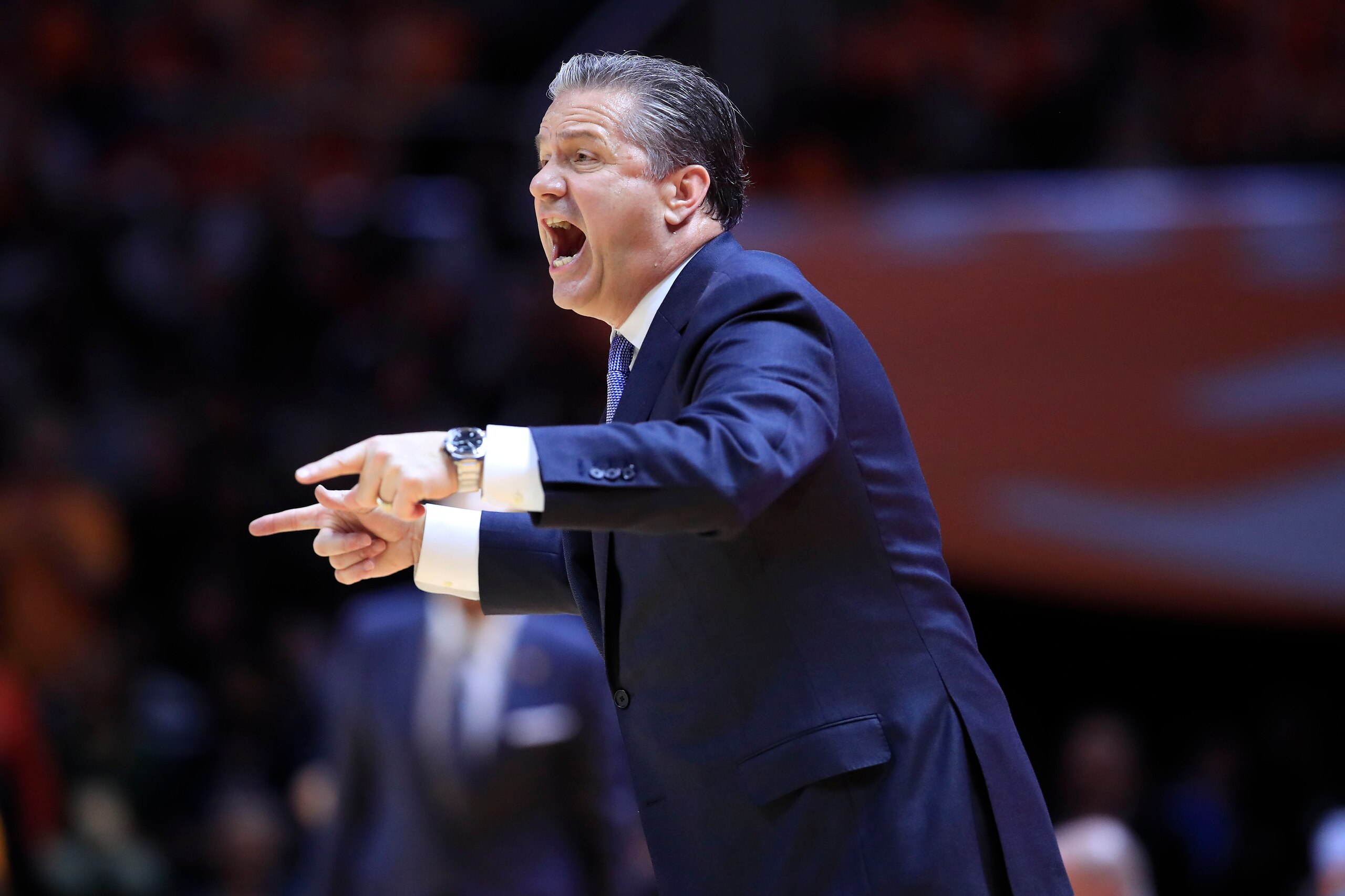 KNOXVILLE, TENNESSEE - MARCH 02: John Calipari the head coach of the Kentucky Wildcats gives instructions to his team in the game against the Tennessee Volunteers at Thompson-Boling Arena on March 02, 2019 in Knoxville, Tennessee. (Photo by Andy Lyons/G KNOXVILLE, TENNESSEE - MARCH 02: John Calipari the head coach of the Kentucky Wildcats gives instructions to his team in the game against the Tennessee Volunteers at Thompson-Boling Arena on March 02, 2019 in Knoxville, Tennessee. (Photo by Andy Lyons/G