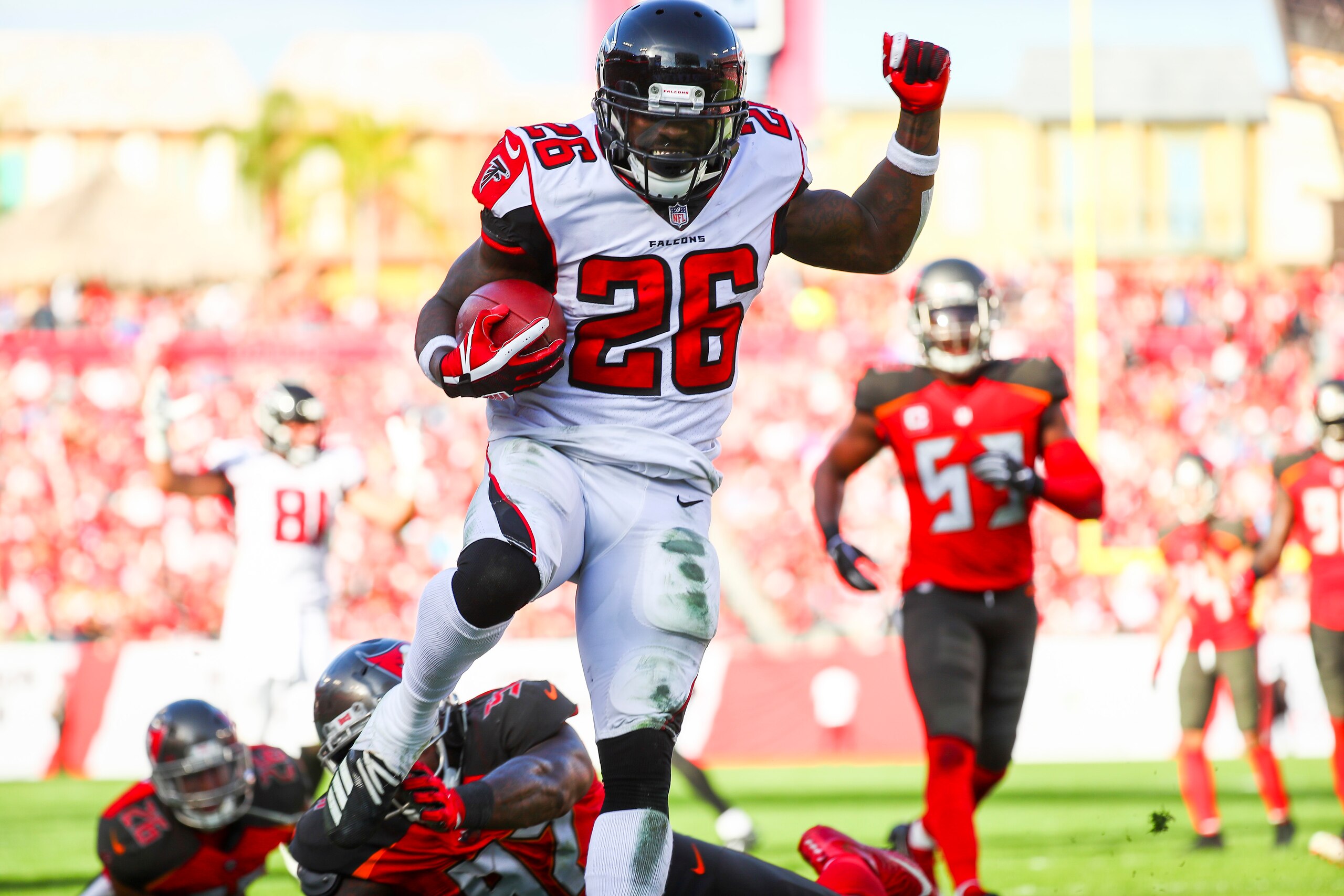 TAMPA, FL - DECEMBER 30: Running back Tevin Coleman #26 of the Atlanta Falcons high steps into the end zone to score in the third quarter of the game at Raymond James Stadium on December 30, 2018 in Tampa, Florida. (Photo by Will Vragovic/Getty Images)