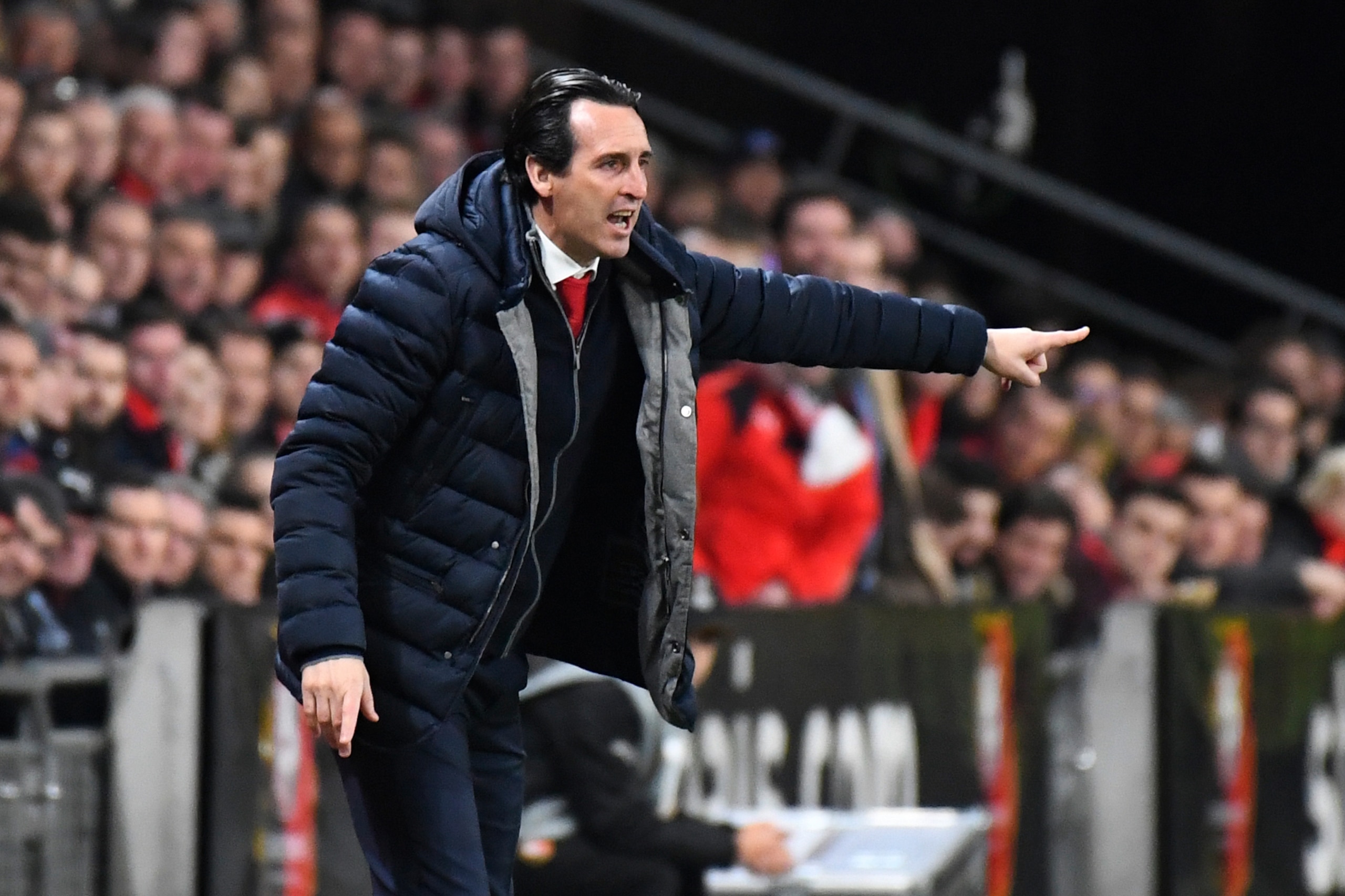 Arsenal's Spanish head coach Unai Emery gestures during the UEFA Europa League round of 16 first leg football match between Stade Rennais FC and Arsenal FC at the Roazhon Park stadium in Rennes, northwestern France on March 7, 2019. (Photo by DAMIEN MEYER