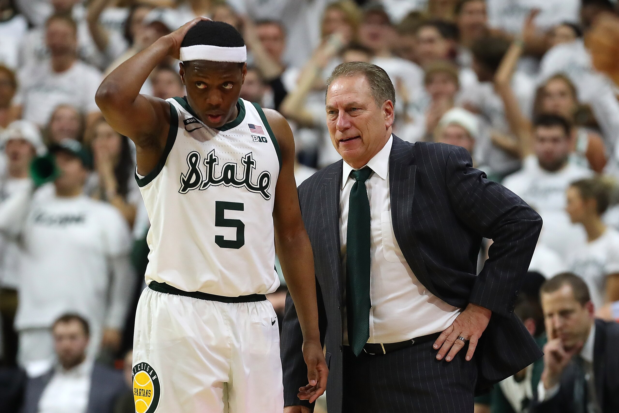 EAST LANSING, MI - MARCH 09:  Head coach Tom Izzo and Cassius Winston #5 of the Michigan State Spartans react during the second half against the Michigan Wolverines at Breslin Center on March 9, 2019 in East Lansing, Michigan. (Photo by Gregory Shamus/Get