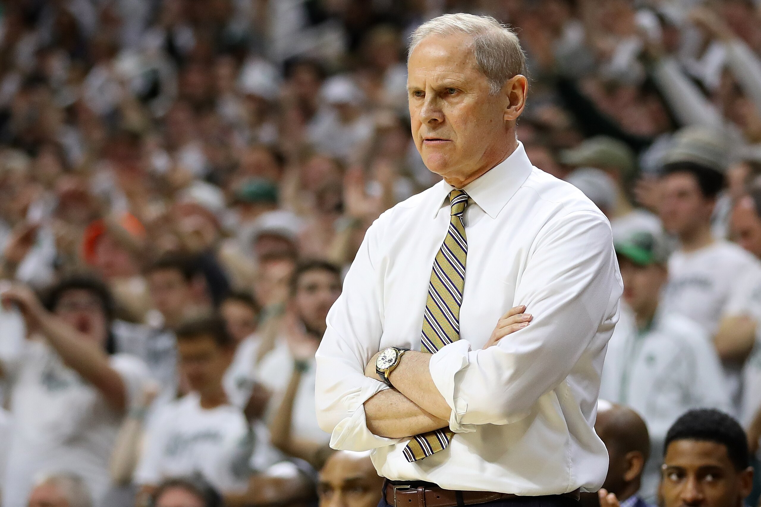 EAST LANSING, MI - MARCH 09:  Head coach John Beilein of the Michigan Wolverines looks on during the first half against the Michigan State Spartans at Breslin Center on March 9, 2019 in East Lansing, Michigan. (Photo by Gregory Shamus/Getty Images)