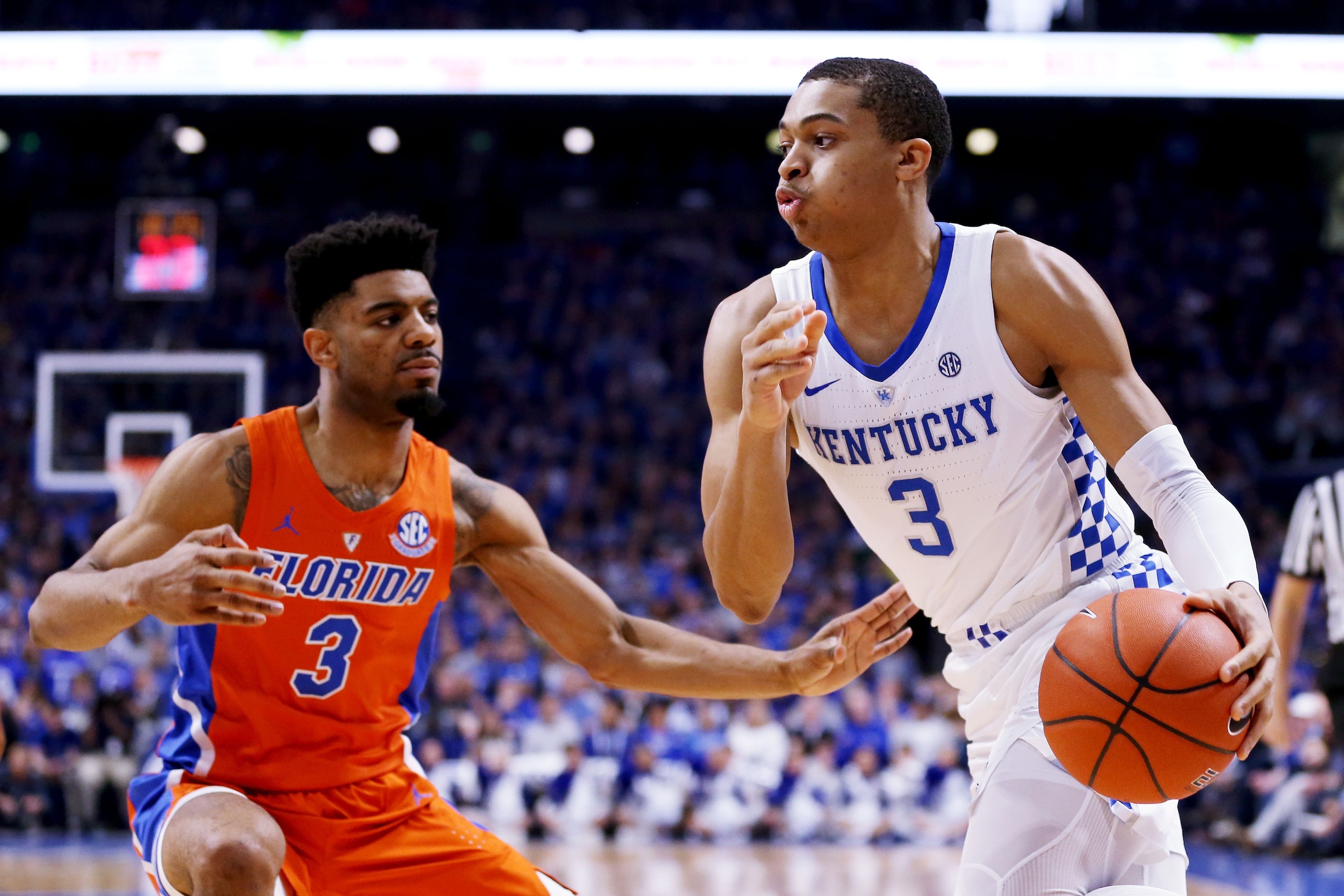 LEXINGTON, KENTUCKY - MARCH 09:  Keldon Johnson #3 of the Kentucky Wildcats dribbles the ball while being guarded by Jalen Hudson #3 of the Florida Gators in the first half at Rupp Arena on March 09, 2019 in Lexington, Kentucky. (Photo by Dylan Buell/Gett