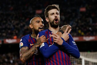 BARCELONA, SPAIN - MARCH 9: Gerard Pique of FC Barcelona, celebrate his goal the 1-1 with Arturo Vidal of FC Barcelona during the La Liga Santander  match between FC Barcelona v Rayo Vallecano at the Camp Nou on March 9, 2019 in Barcelona Spain (Photo by 