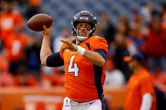 DENVER, CO - DECEMBER 30:  Quarterback Case Keenum #4 of the Denver Broncos throws as he warms hip before a game against the Los Angeles Chargers at Broncos Stadium at Mile High on December 30, 2018 in Denver, Colorado. (Photo by Justin Edmonds/Getty Imag