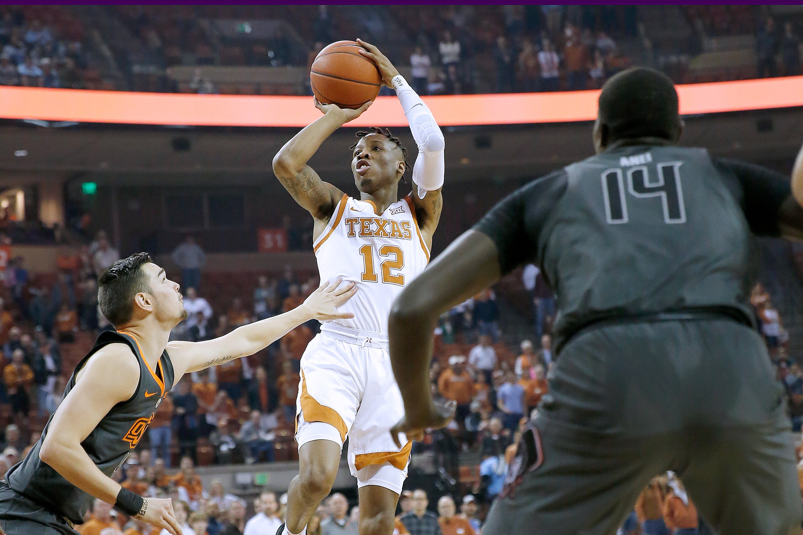 AUSTIN, TEXAS - FEBRUARY 16: Kerwin Roach II #12 of the Texas Longhorns shoots over Thomas Dziagwa #4 of the Oklahoma State Cowboys at The Frank Erwin Center on February 16, 2019 in Austin, Texas. (Photo by Chris Covatta/Getty Images) AUSTIN, TEXAS - FEBRUARY 16: Kerwin Roach II #12 of the Texas Longhorns shoots over Thomas Dziagwa #4 of the Oklahoma State Cowboys at The Frank Erwin Center on February 16, 2019 in Austin, Texas. (Photo by Chris Covatta/Getty Images)