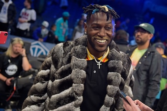 CHARLOTTE, NC - FEBRUARY 17: NFL player, Antonio Brown smiles and laughs during the 2019 NBA All-Star Game on February 17, 2019 at Spectrum Center in Charlotte, North Carolina. NOTE TO USER: User expressly acknowledges and agrees that, by downloading and 