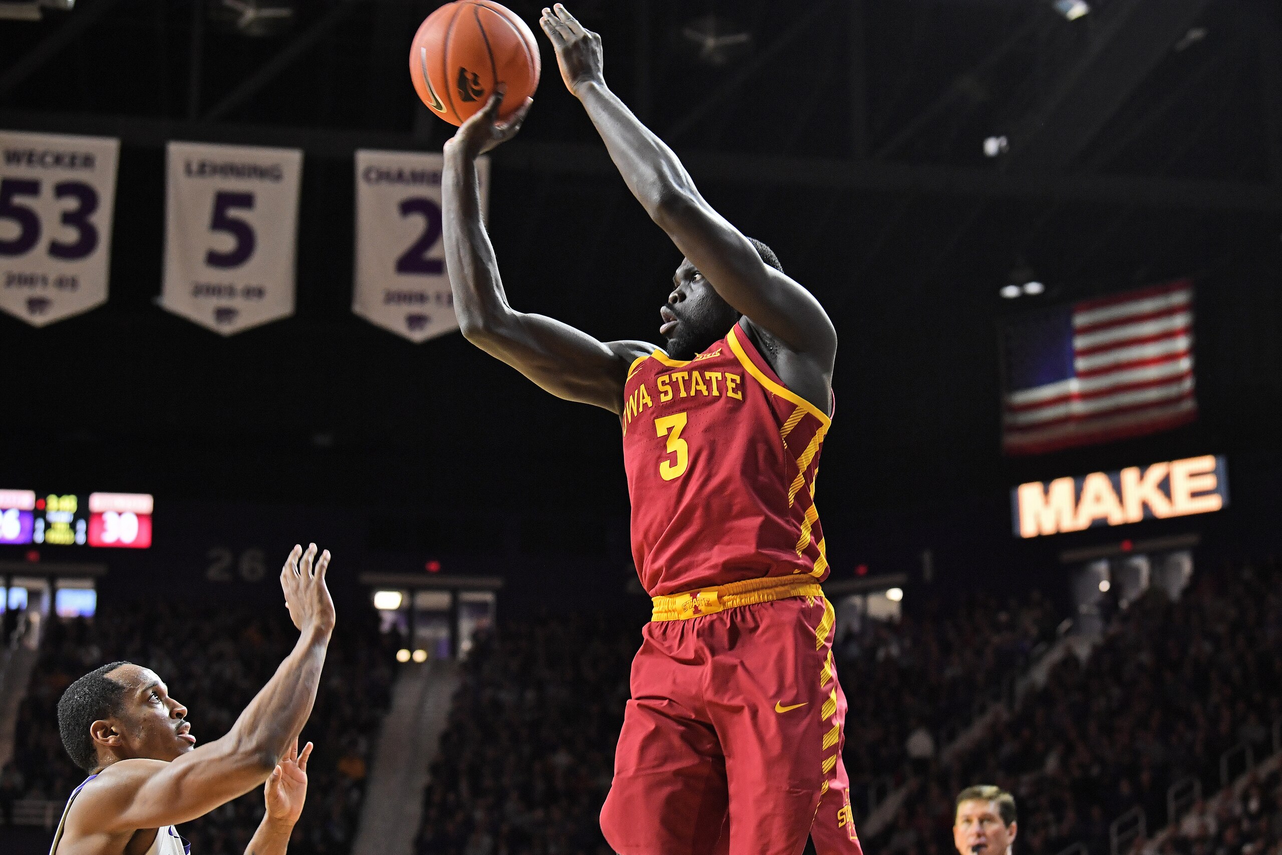 MANHATTAN, KS - FEBRUARY 16:  Marial Shayok #3 of the Iowa State Cyclones hits a three-point basket against Barry Brown Jr. #5 of the Kansas State Wildcats during the first half on February 16, 2019 at Bramlage Coliseum in Manhattan, Kansas.  (Photo by Pe