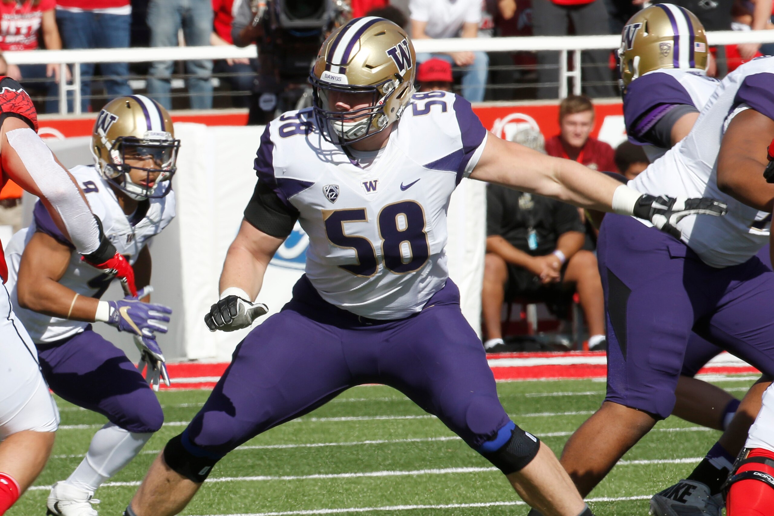 SALT LAKE CITY, UT - OCTOBER 29: Kaleb McGary #58 of the Washington Huskies blocks against the Utah Utes at an NCAA football game at Rice-Eccles Stadium on October 29, 2016 in Salt Lake City, Utah. (Photo by George Frey/Getty Images) Local Caption ***Kale SALT LAKE CITY, UT - OCTOBER 29: Kaleb McGary #58 of the Washington Huskies blocks against the Utah Utes at an NCAA football game at Rice-Eccles Stadium on October 29, 2016 in Salt Lake City, Utah. (Photo by George Frey/Getty Images) Local Caption ***Kale