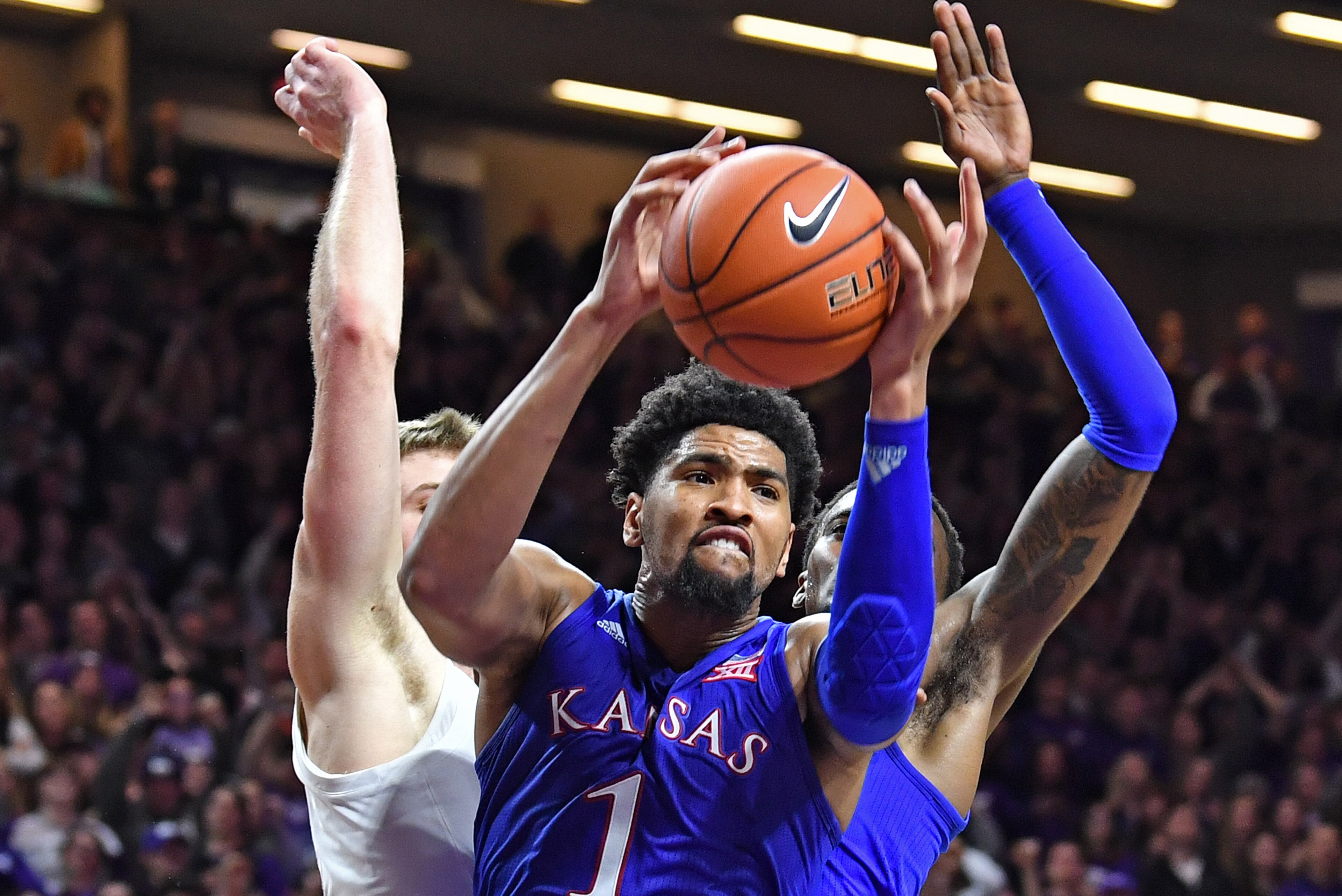 MANHATTAN, KS - February 05: Dedric Lawson #1 of the Kansas Jayhawks grabs a defensive rebound against the Kansas State Wildcats during the second half on February 5, 2019 at Bramlage Coliseum in Manhattan, Kansas. (Photo by Peter G. Aiken/Getty Images) MANHATTAN, KS - February 05: Dedric Lawson #1 of the Kansas Jayhawks grabs a defensive rebound against the Kansas State Wildcats during the second half on February 5, 2019 at Bramlage Coliseum in Manhattan, Kansas. (Photo by Peter G. Aiken/Getty Images)