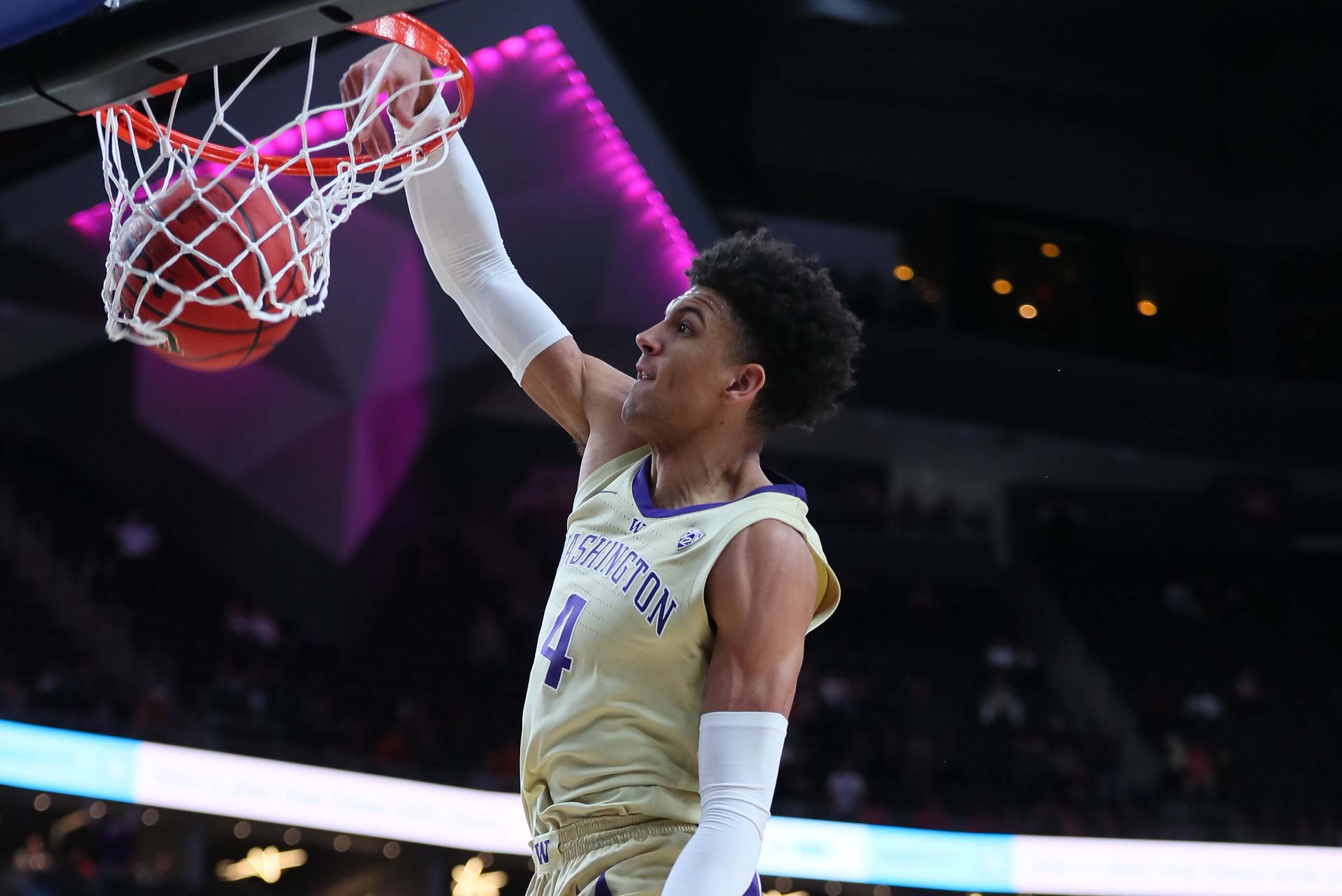 LAS VEGAS, NEVADA - MARCH 14: Matisse Thybulle #4 of the Washington Huskies dunks the ball against the USC Trojans in the 2nd half during a quarterfinal game of the Pac-12 basketball tournament at T-Mobile Arena on March 14, 2019 in Las Vegas, Nevada. (Ph