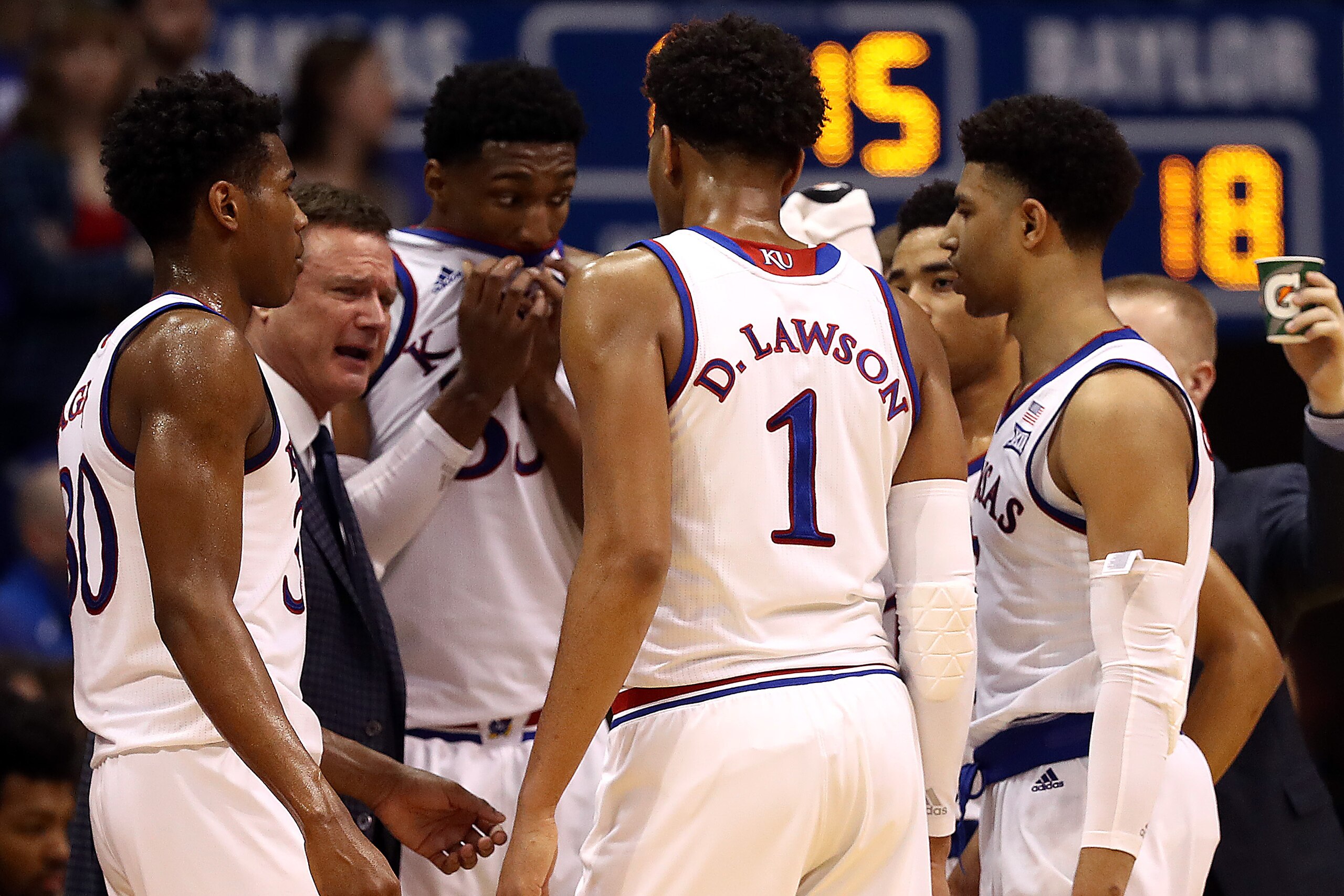 LAWRENCE, KANSAS - MARCH 09: Head coach Bill Self of the Kansas Jayhawks talks with players during a timeout in the game against the Baylor Bears at Allen Fieldhouse on March 09, 2019 in Lawrence, Kansas. (Photo by Jamie Squire/Getty Images) LAWRENCE, KANSAS - MARCH 09: Head coach Bill Self of the Kansas Jayhawks talks with players during a timeout in the game against the Baylor Bears at Allen Fieldhouse on March 09, 2019 in Lawrence, Kansas. (Photo by Jamie Squire/Getty Images)
