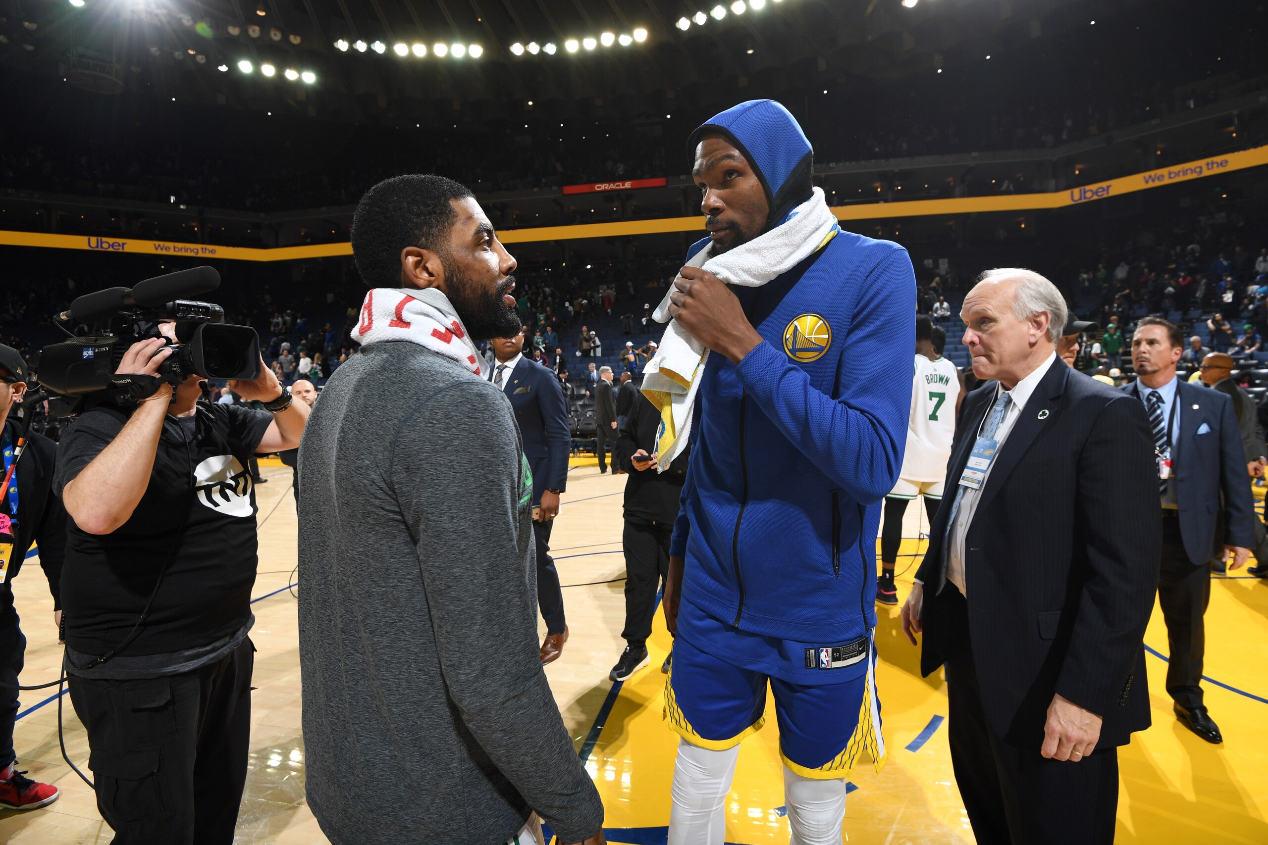 OAKLAND, CA - MARCH 5:  Kyrie Irving #11 of the Boston Celtics speaks with Kevin Durant #35 of the Golden State Warriors after the game on March 5, 2019 at ORACLE Arena in Oakland, California. NOTE TO USER: User expressly acknowledges and agrees that, by 