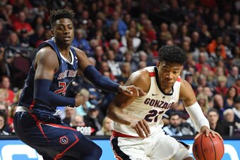 LAS VEGAS, NEVADA - MARCH 12:  Rui Hachimura #21 of the Gonzaga Bulldogs drives against Malik Fitts #24 of the Saint Mary's Gaels during the championship game of the West Coast Conference basketball tournament at the Orleans Arena on March 12, 2019 in Las