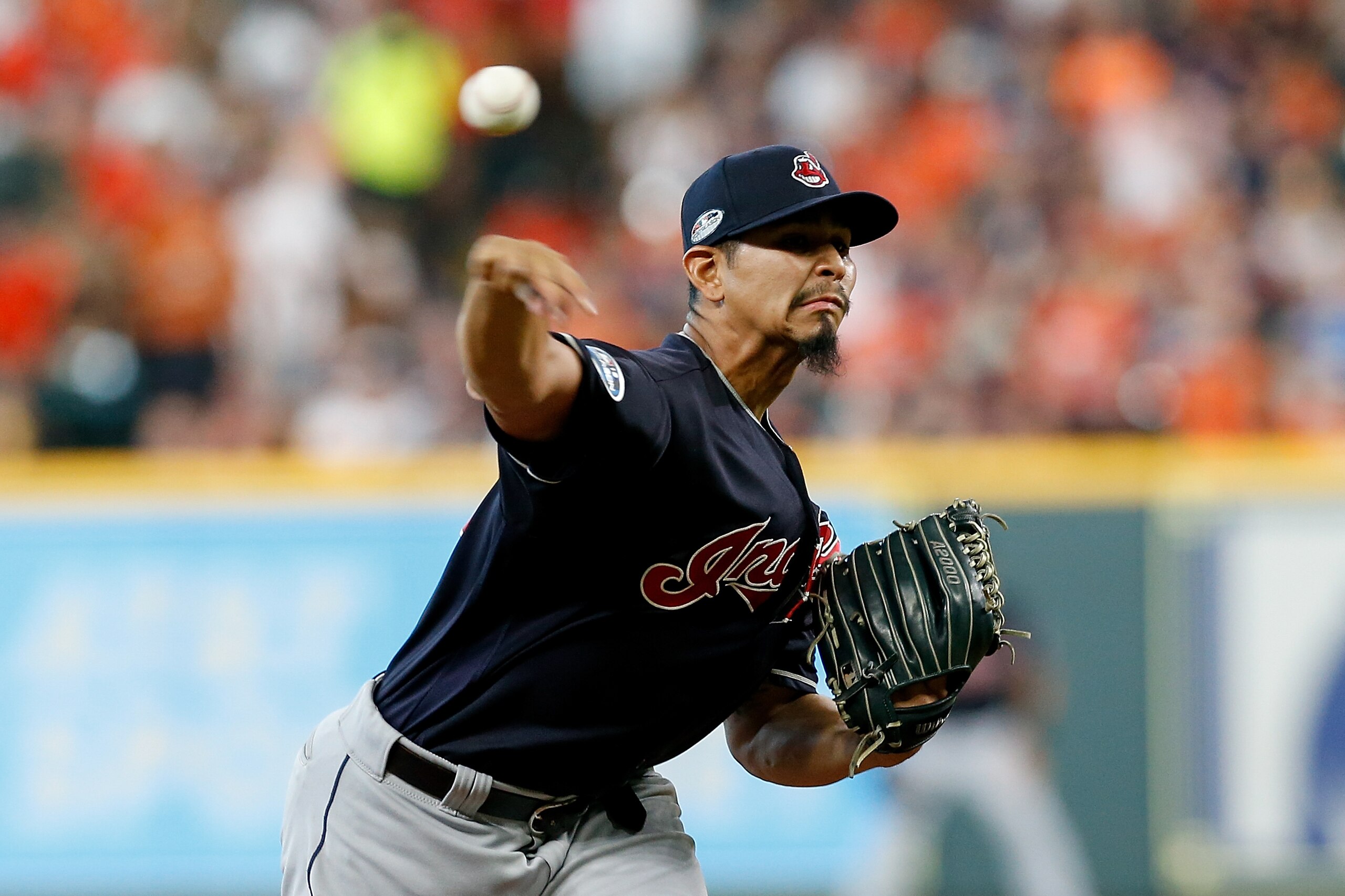 HOUSTON, TX - OCTOBER 06:  Carlos Carrasco #59 of the Cleveland Indians delivers a pitch in the first inning against the Houston Astros during Game Two of the American League Division Series at Minute Maid Park on October 6, 2018 in Houston, Texas.  (Phot