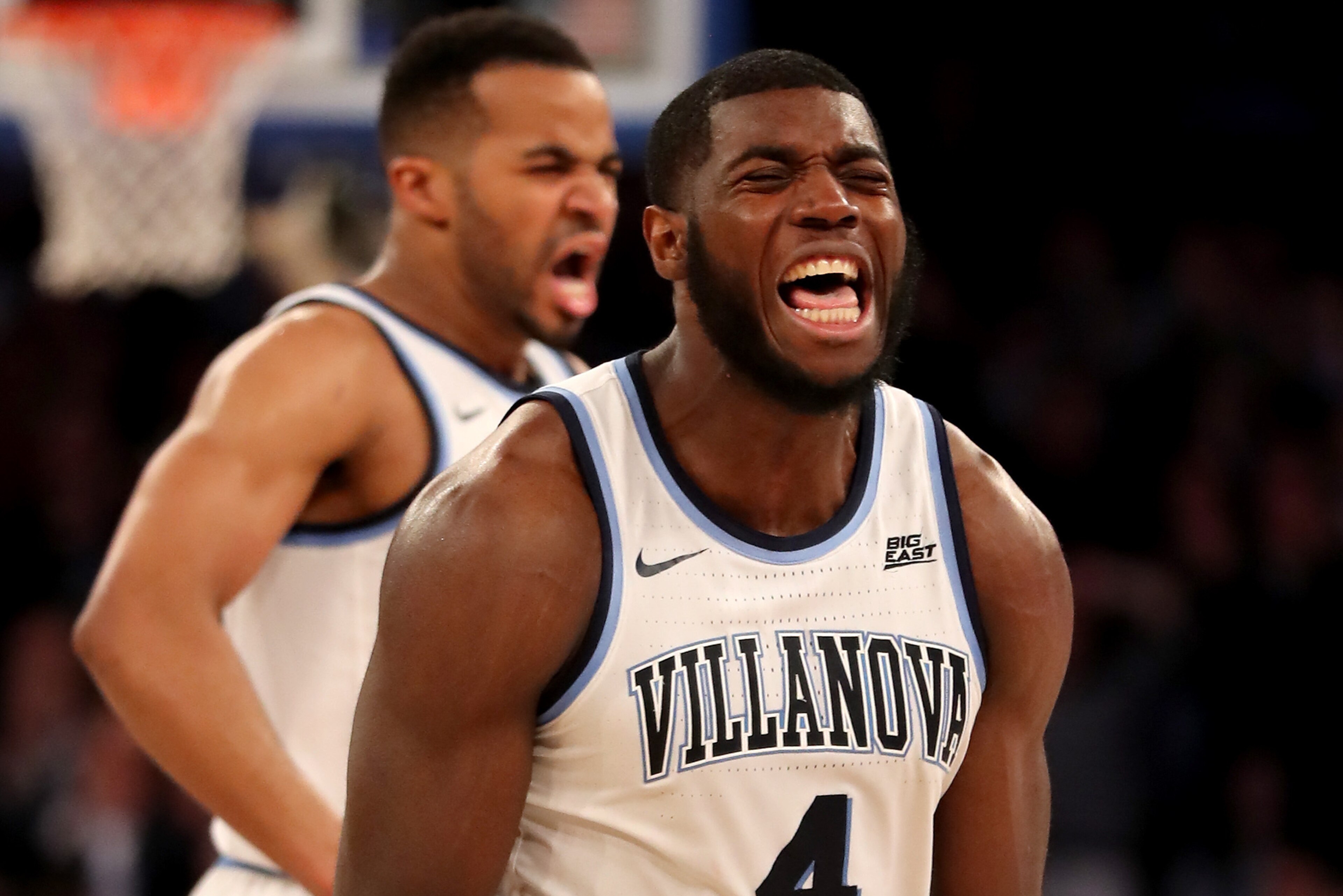 NEW YORK, NEW YORK - MARCH 15:  Eric Paschall #4 and Phil Booth #5 of the Villanova Wildcats celebrate in the final minutes of the game against the Xavier Musketeers during the semifinal round of the Big East Tournament at Madison Square Garden on March 1