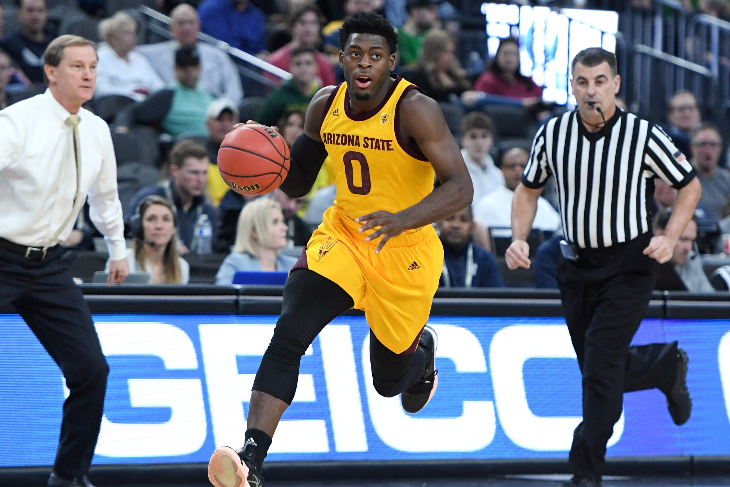 LAS VEGAS, NEVADA - MARCH 15:  Luguentz Dort #0 of the Arizona State Sun Devils brings the ball up the court against the Oregon Ducks during a semifinal game of the Pac-12 basketball tournament at T-Mobile Arena on March 15, 2019 in Las Vegas, Nevada. The
