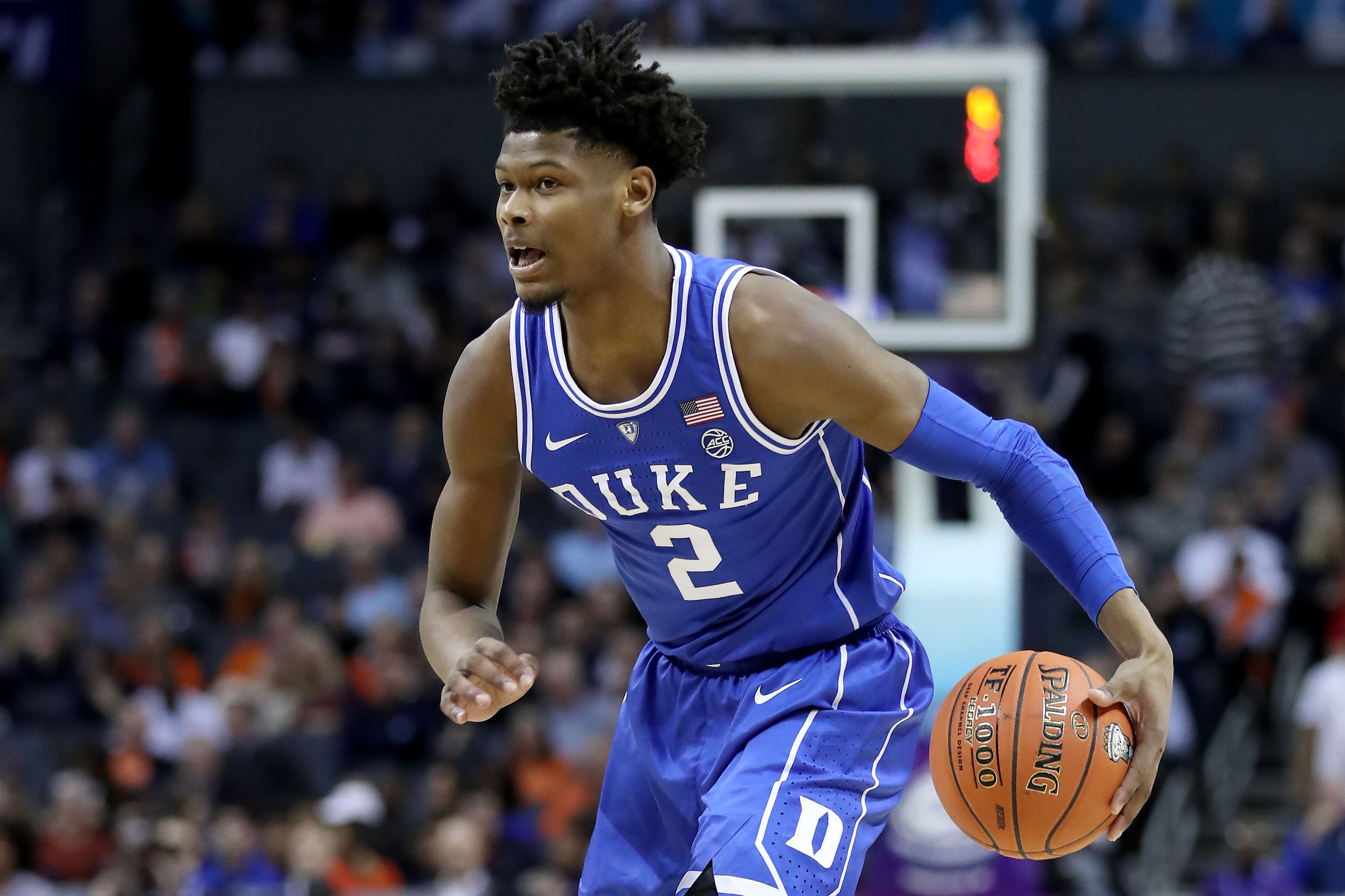 CHARLOTTE, NORTH CAROLINA - MARCH 15: Cam Reddish #2 of the Duke Blue Devils dribbles down court against the North Carolina Tar Heels during their game in the semifinals of the 2019 Men's ACC Basketball Tournament at Spectrum Center on March 15, 2019 in C