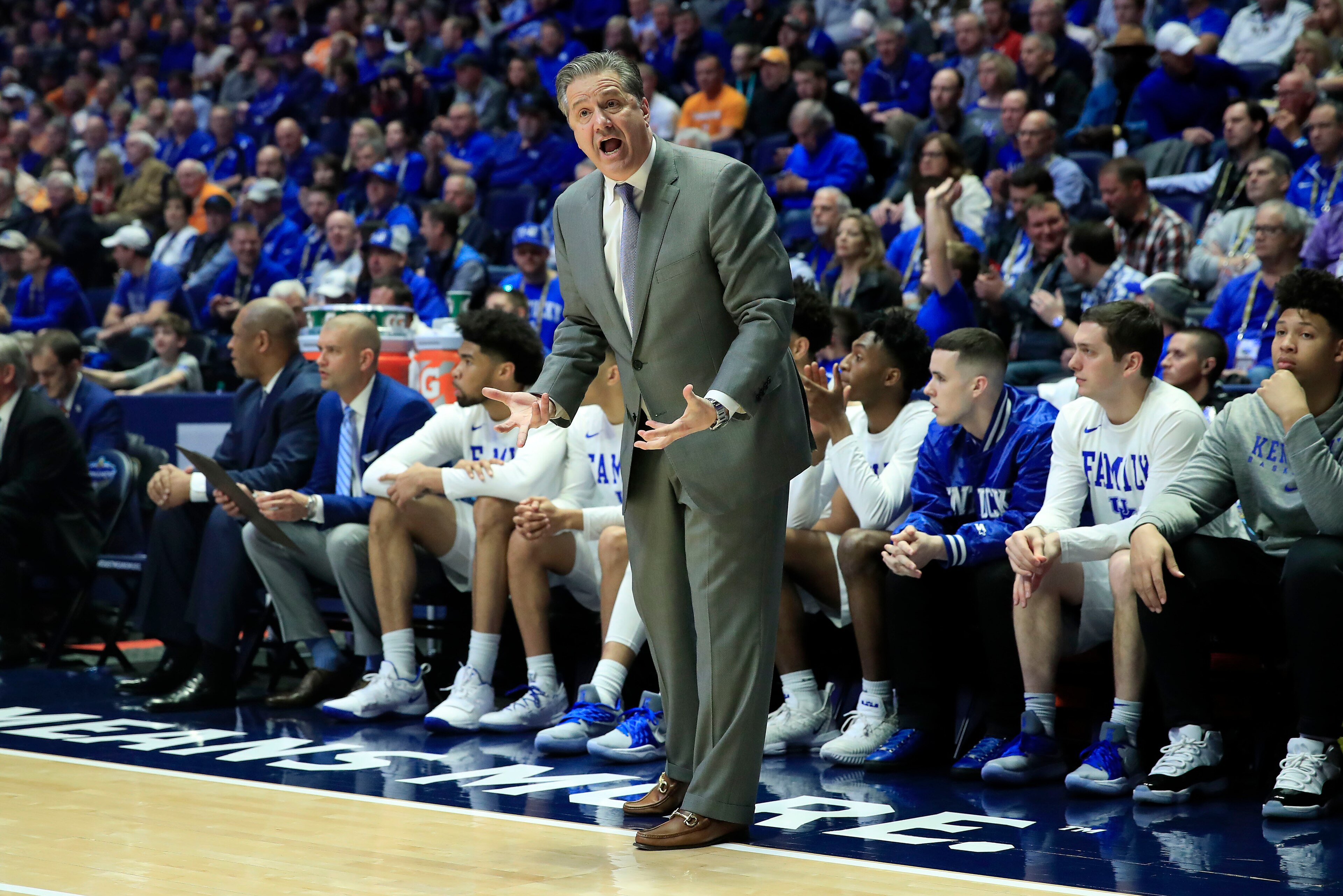NASHVILLE, TENNESSEE - MARCH 15: John Calipari the head coach of the Kentucky Wildcats gives instructions to his team against the Alabama Crimson Tide during the Quarterfinals of the SEC Basketball Tournament at Bridgestone Arena on March 15, 2019 in Nas NASHVILLE, TENNESSEE - MARCH 15: John Calipari the head coach of the Kentucky Wildcats gives instructions to his team against the Alabama Crimson Tide during the Quarterfinals of the SEC Basketball Tournament at Bridgestone Arena on March 15, 2019 in Nas