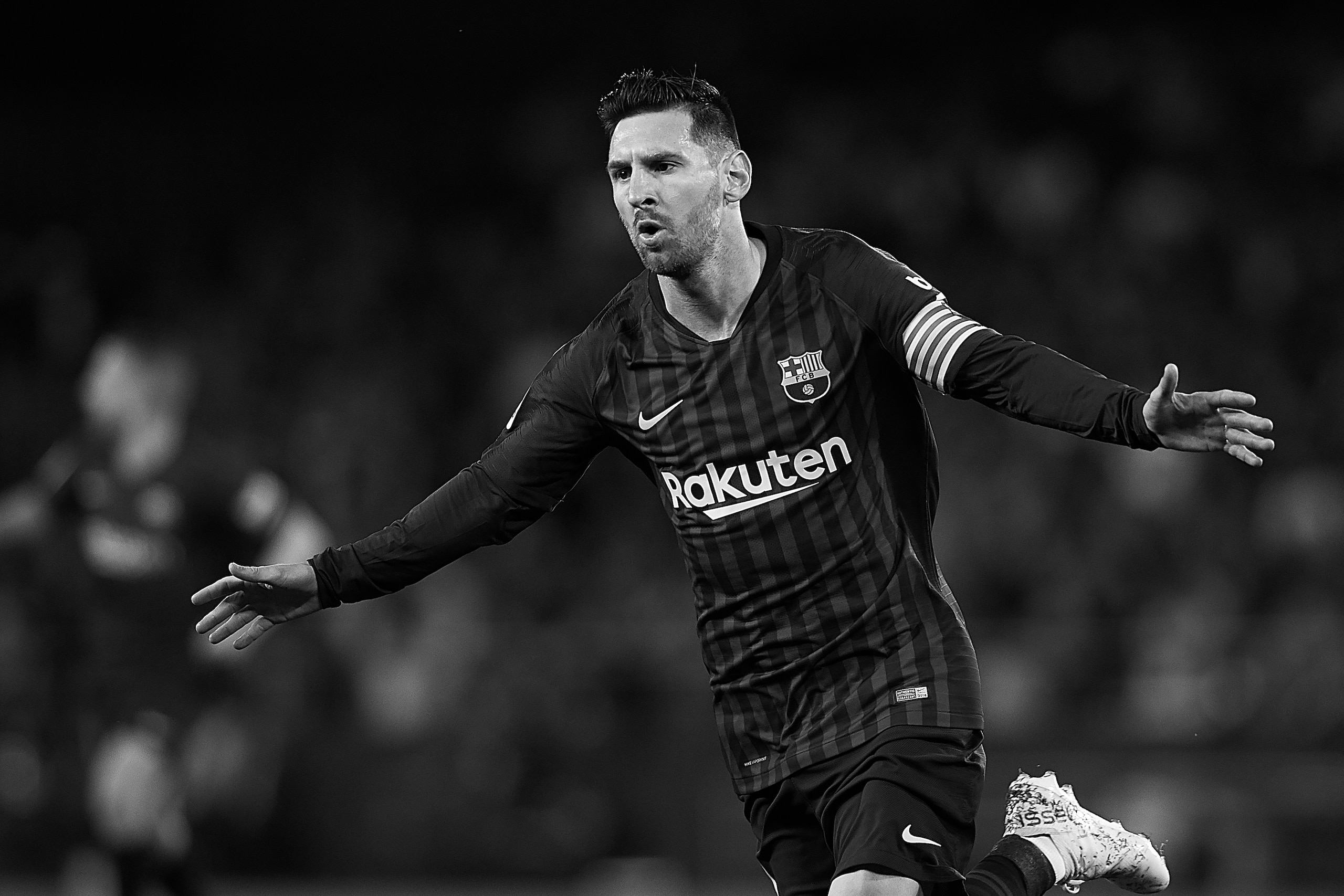SEVILLE, SPAIN - MARCH 17: (EDITORS NOTE: This image has been converted to black and white) Lionel Messi of FC Barcelona celebrates scoring his team's opening goal during the La Liga match between Real Betis Balompie and FC Barcelona at Estadio Benito Vi SEVILLE, SPAIN - MARCH 17: (EDITORS NOTE: This image has been converted to black and white) Lionel Messi of FC Barcelona celebrates scoring his team's opening goal during the La Liga match between Real Betis Balompie and FC Barcelona at Estadio Benito Vi