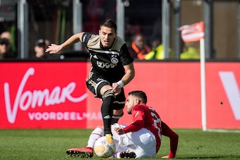 (L-R) Dusan Tadic of Ajax, Adam Maher of AZ during the Dutch Eredivisie match between AZ Alkmaar and Ajax Amsterdam at AFAS stadium on March 17, 2019 in Alkmaar, The Netherlands(Photo by VI Images via Getty Images)