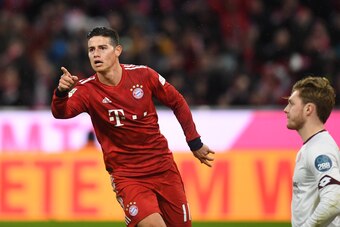 Bayern Munich's Colombian James Rodriguez reacts after his first goal during the German first division Bundesliga football match FC Bayern Munich v FSV Mainz 05 in Munich, southern Germany on March 17, 2019. (Photo by Christof STACHE / AFP) / RESTRICTIONS