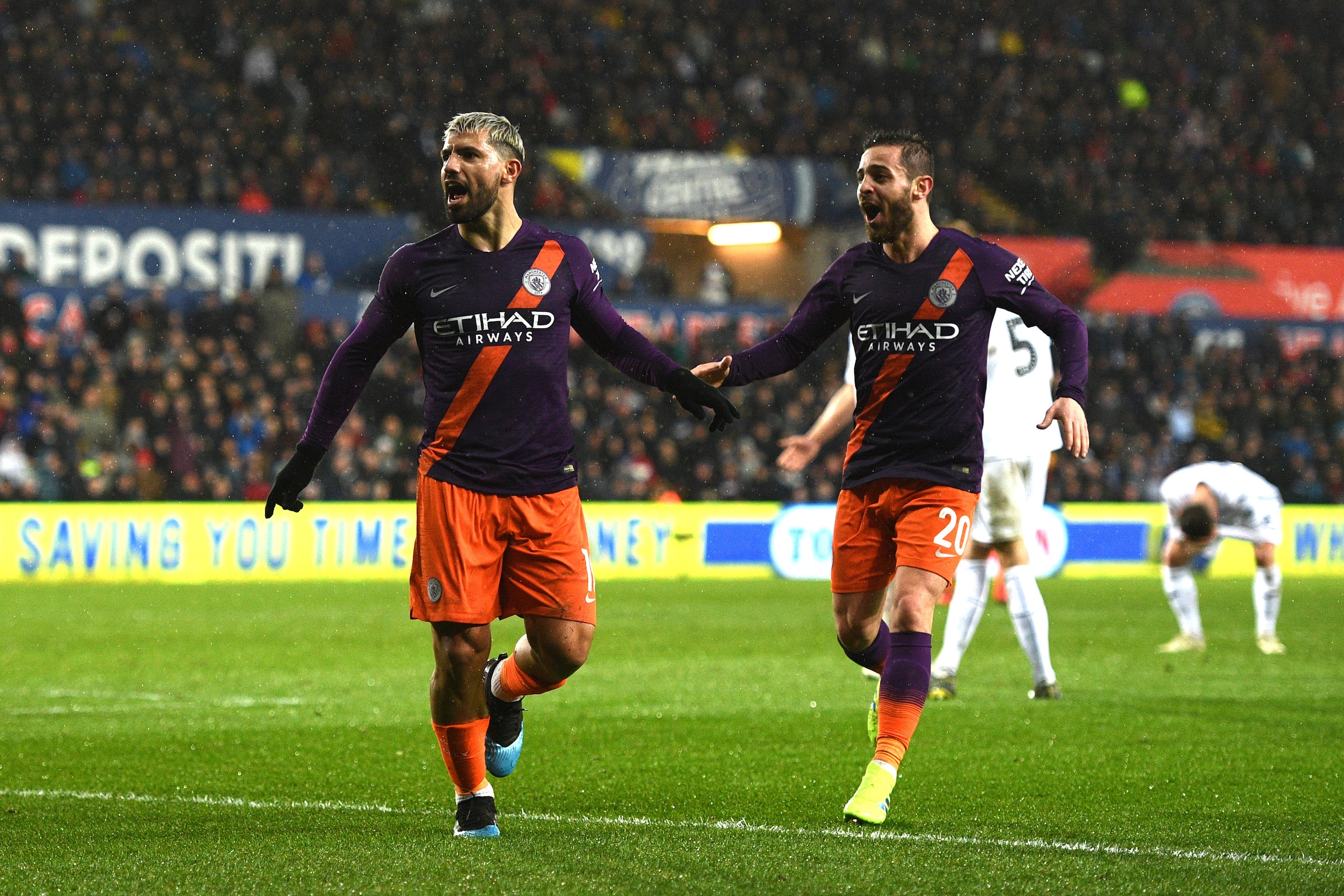 SWANSEA, WALES - MARCH 16: Sergio Aguero of Manchester City celebrates after scoring his team's third goal with Bernardo Silva of Manchester City during the FA Cup Quarter Final match between Swansea City and Manchester City at Liberty Stadium on March 16 SWANSEA, WALES - MARCH 16: Sergio Aguero of Manchester City celebrates after scoring his team's third goal with Bernardo Silva of Manchester City during the FA Cup Quarter Final match between Swansea City and Manchester City at Liberty Stadium on March 16