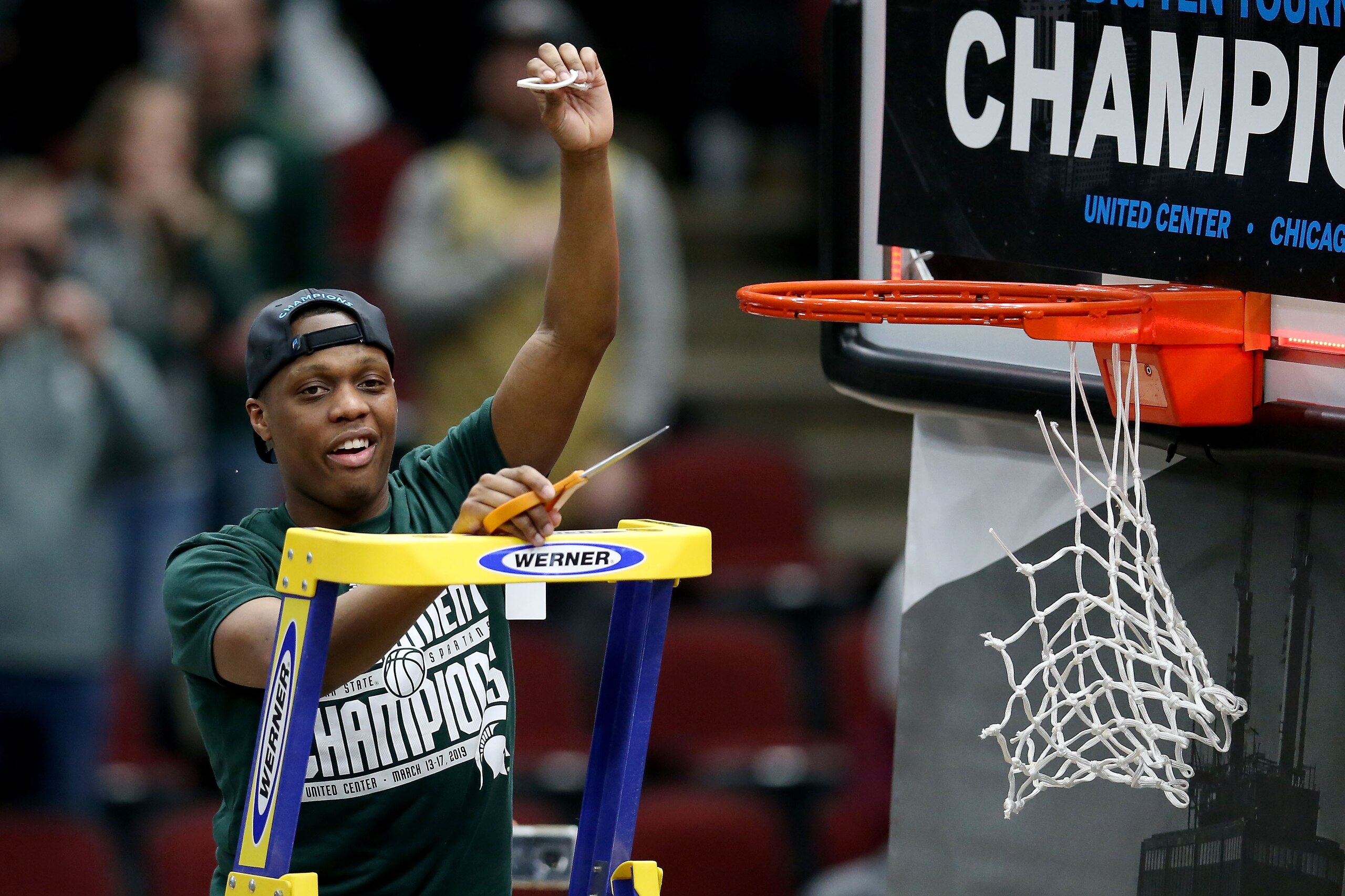 CHICAGO, ILLINOIS - MARCH 17:  Cassius Winston #5 of the Michigan State Spartans cuts down the net after beating the Michigan Wolverines 65-60 in the championship game of the Big Ten Basketball Tournament at the United Center on March 17, 2019 in Chicago,