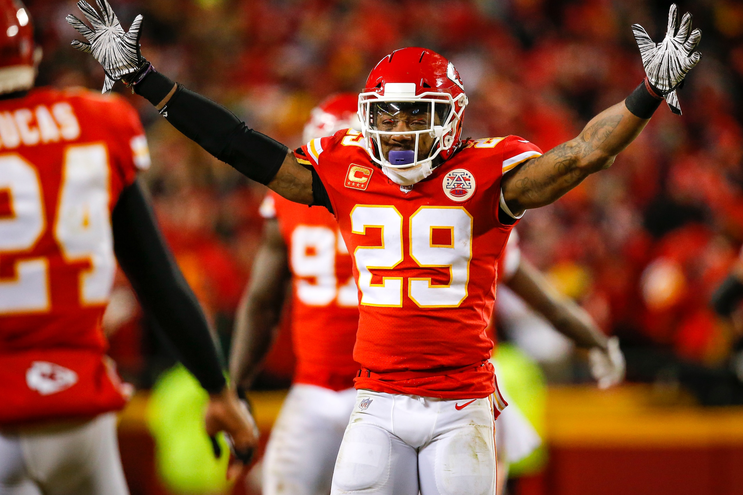 KANSAS CITY, MO - JANUARY 20: Safety Eric Berry #29 of the Kansas City Chiefs celebrates the fourth quarter interception of teammate safety Daniel Sorensen #49 of the Kansas City Chiefs against the New England Patriots in the AFC Championship Game at Arro