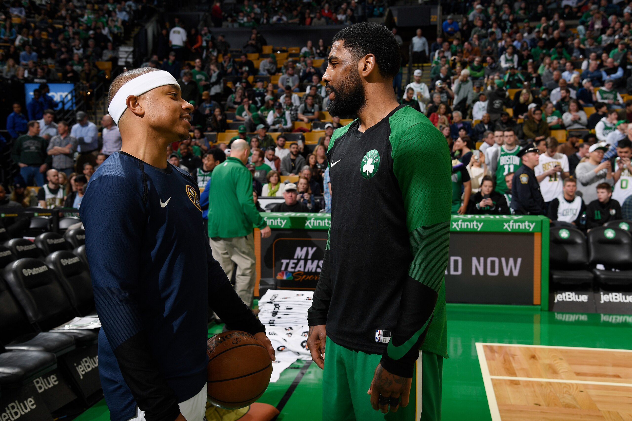 BOSTON, MA - MARCH 18:  Isaiah Thomas #0 of the Denver Nuggets and Kyrie Irving #11 of the Boston Celtics chat before the game thon March 18, 2019 at the TD Garden in Boston, Massachusetts.  NOTE TO USER: User expressly acknowledges and agrees that, by do