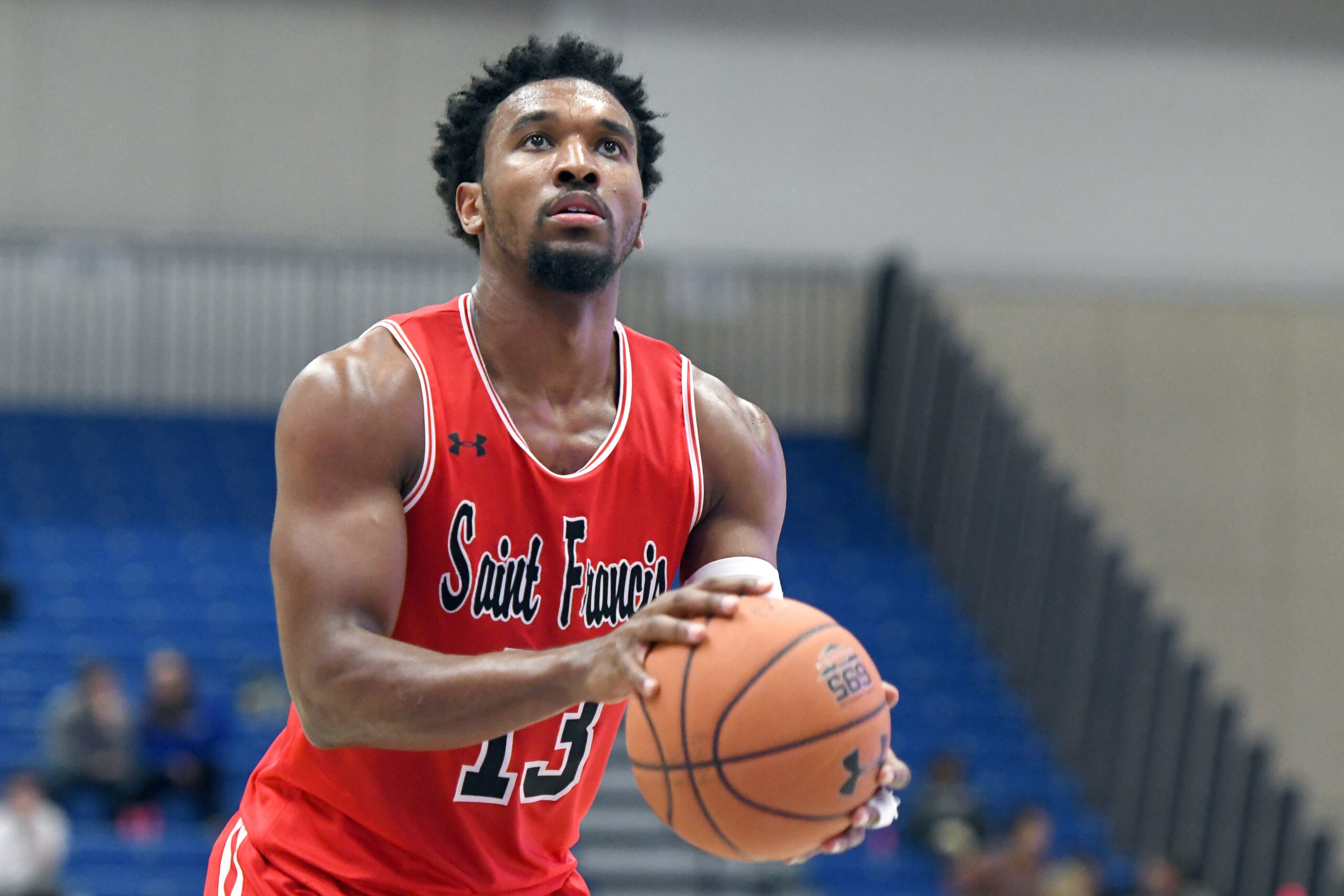 WASHINGTON, DC - DECEMBER 04:  Keith Braxton #13 of the St. Francis (Pa) Red Flash takes a foul shot during a college basketball game against the American University Eagles at Bender Arena on December 4, 2018 in Washington, DC.  (Photo by Mitchell Layton/