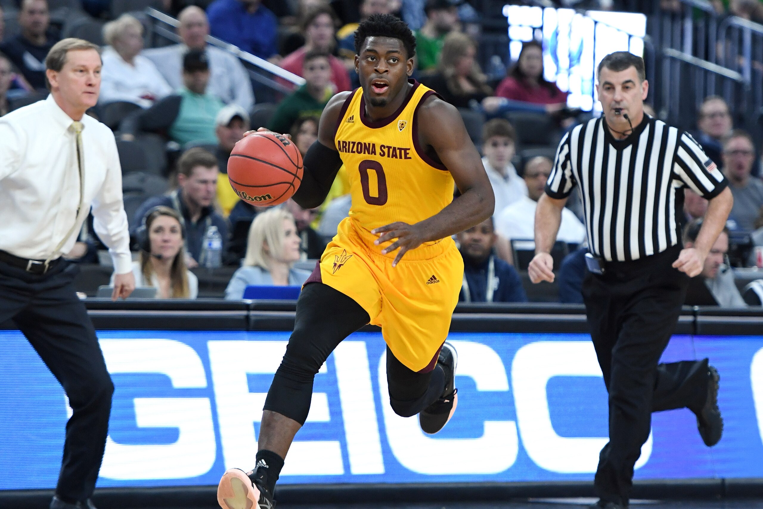 LAS VEGAS, NEVADA - MARCH 15: Luguentz Dort #0 of the Arizona State Sun Devils brings the ball up the court against the Oregon Ducks during a semifinal game of the Pac-12 basketball tournament at T-Mobile Arena on March 15, 2019 in Las Vegas, Nevada. The LAS VEGAS, NEVADA - MARCH 15: Luguentz Dort #0 of the Arizona State Sun Devils brings the ball up the court against the Oregon Ducks during a semifinal game of the Pac-12 basketball tournament at T-Mobile Arena on March 15, 2019 in Las Vegas, Nevada. The