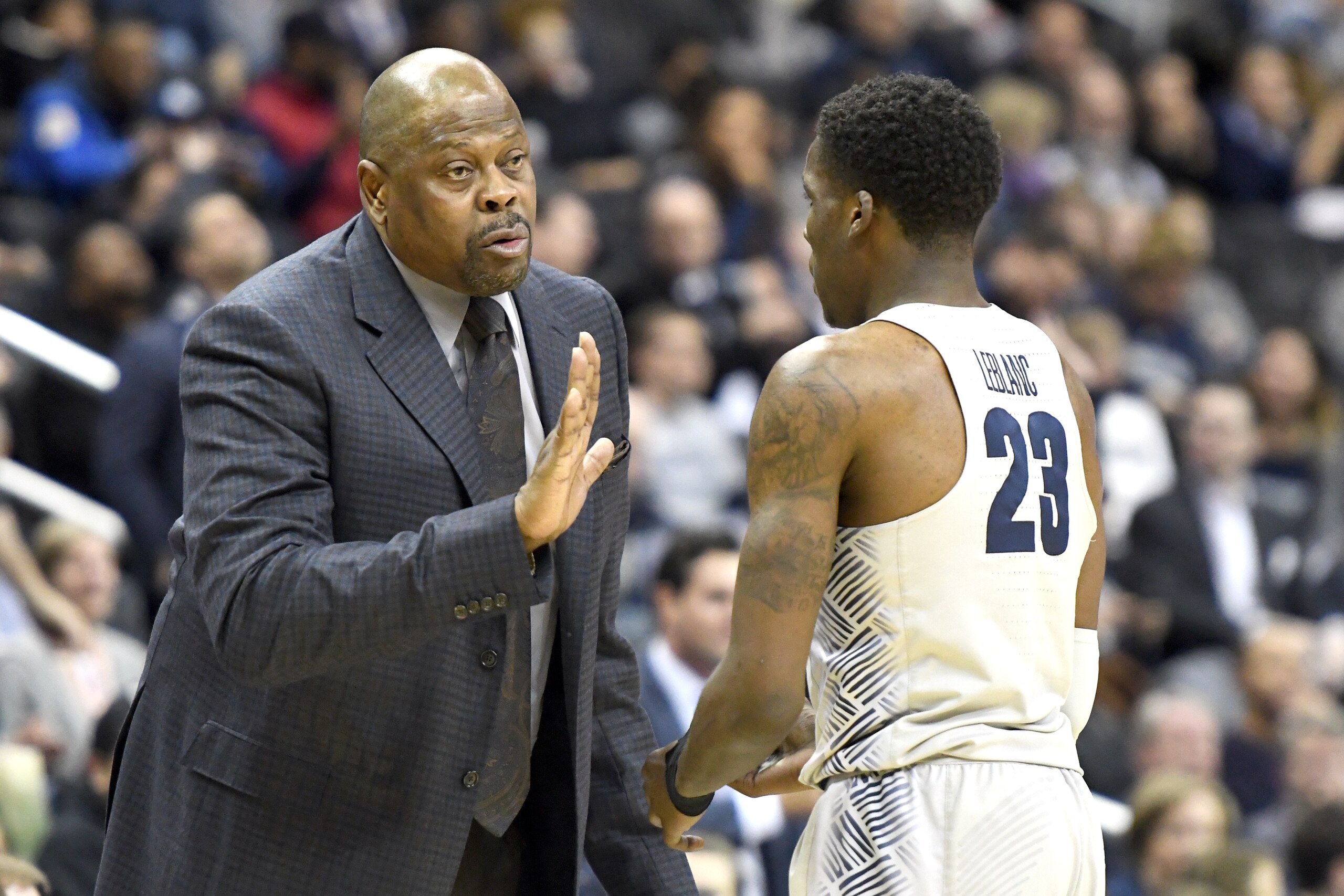 WASHINGTON, DC - JANUARY 31:  Head coach Patrick Ewing of the Georgetown Hoyas talks with Josh LeBlanc #23 during a college basketball game against the Xavier Musketeers at the Capital One Arena on January 31, 2019 in Washington, DC.  (Photo by Mitchell L
